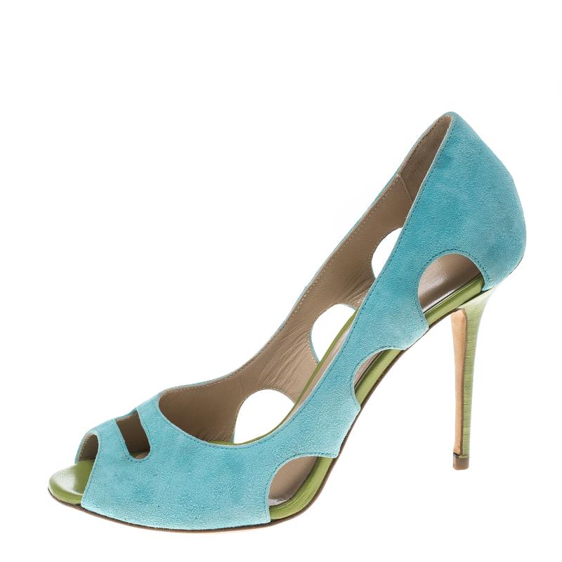 Quirky and fun, these pumps from Manolo Blahnik will add a lively spirit to your look. Crafted from aqua green suede featuring amazing cutouts on the vamps and quarters, these will make for a gorgeous companion to both your summer wedding outfits