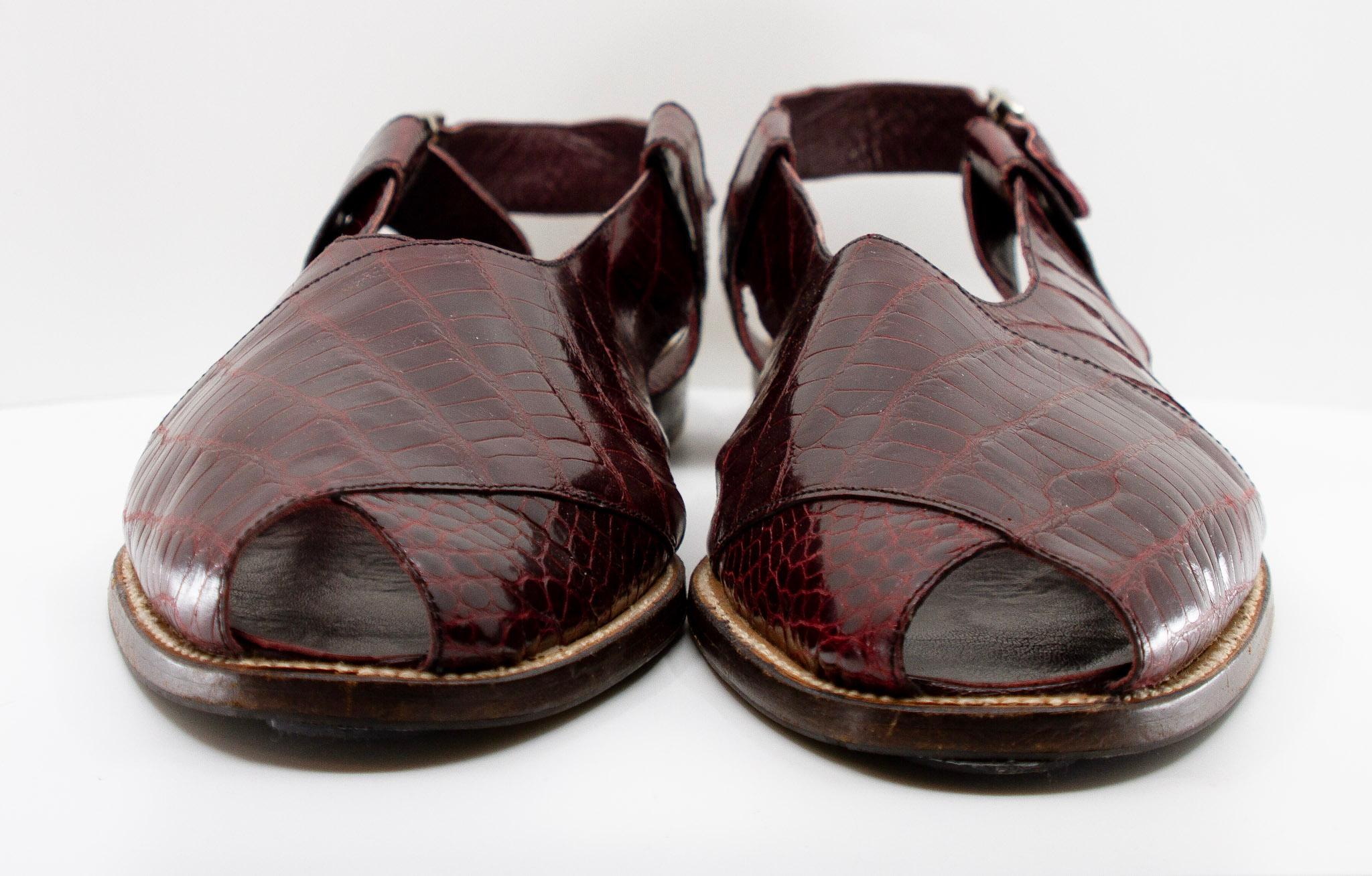 Manolo Blahnik, aubergine alligator open toe sandals, Estate of André Leon Talley.

Size 13

Provenance: Estate of André Leon Talley
