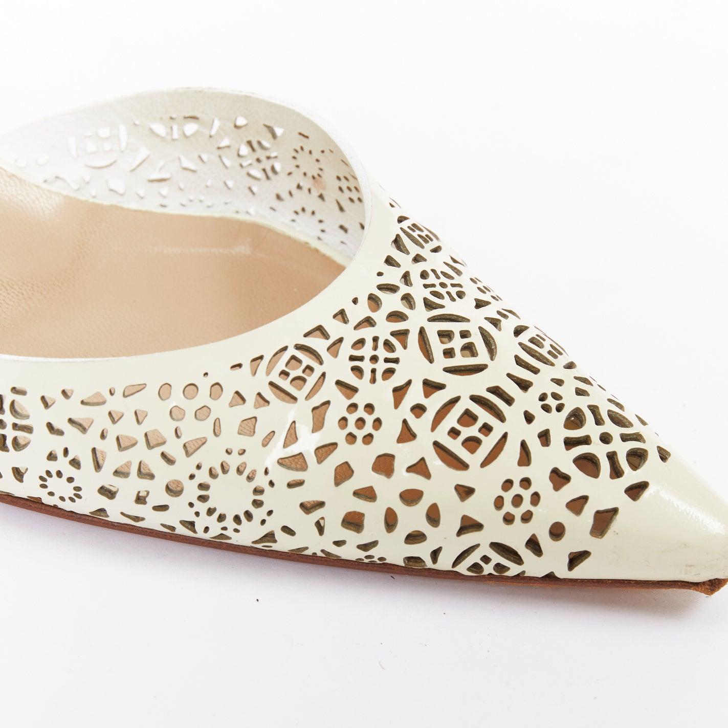 Manolo Blahnik BB70 escarpin en cuir verni crème à découpe laser EU39
Référence : JHDN/A00090
Marque : Manolo Blahnik
MATERIAL : Cuir verni
Couleur : Crème
Motif : Solide
Fermeture : Slingback
Doublure : Cuir nude
Détails supplémentaires : Manolo