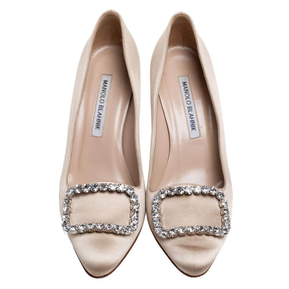 The satin material of these pumps looks absolutely amazing and gives it a royal touch. This pair of Olek pumps from the house of Manolo Blahnik is just what you need to take your style quotient a few notches higher. It is designed with almond toes,