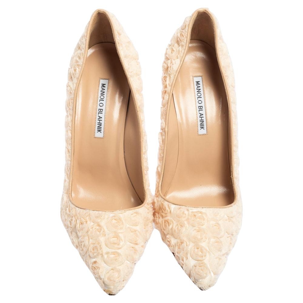 There are some shoes that stand the test of time and fashion cycles, these timeless Manolo Blahnik pumps are the one. Crafted from beige lace with floral motifs all over, they are designed with sleek cuts, pointed-toes, and tall heels.

Includes: