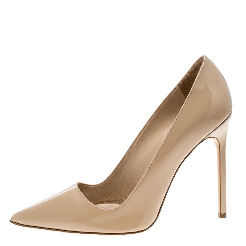 For the stylish woman in you, these beige pumps are the quintessential pick. Slip into this impeccable pair lined with leather. Complete the fancy look with this one designed by Manolo Blahnik.

Includes: Original Box

