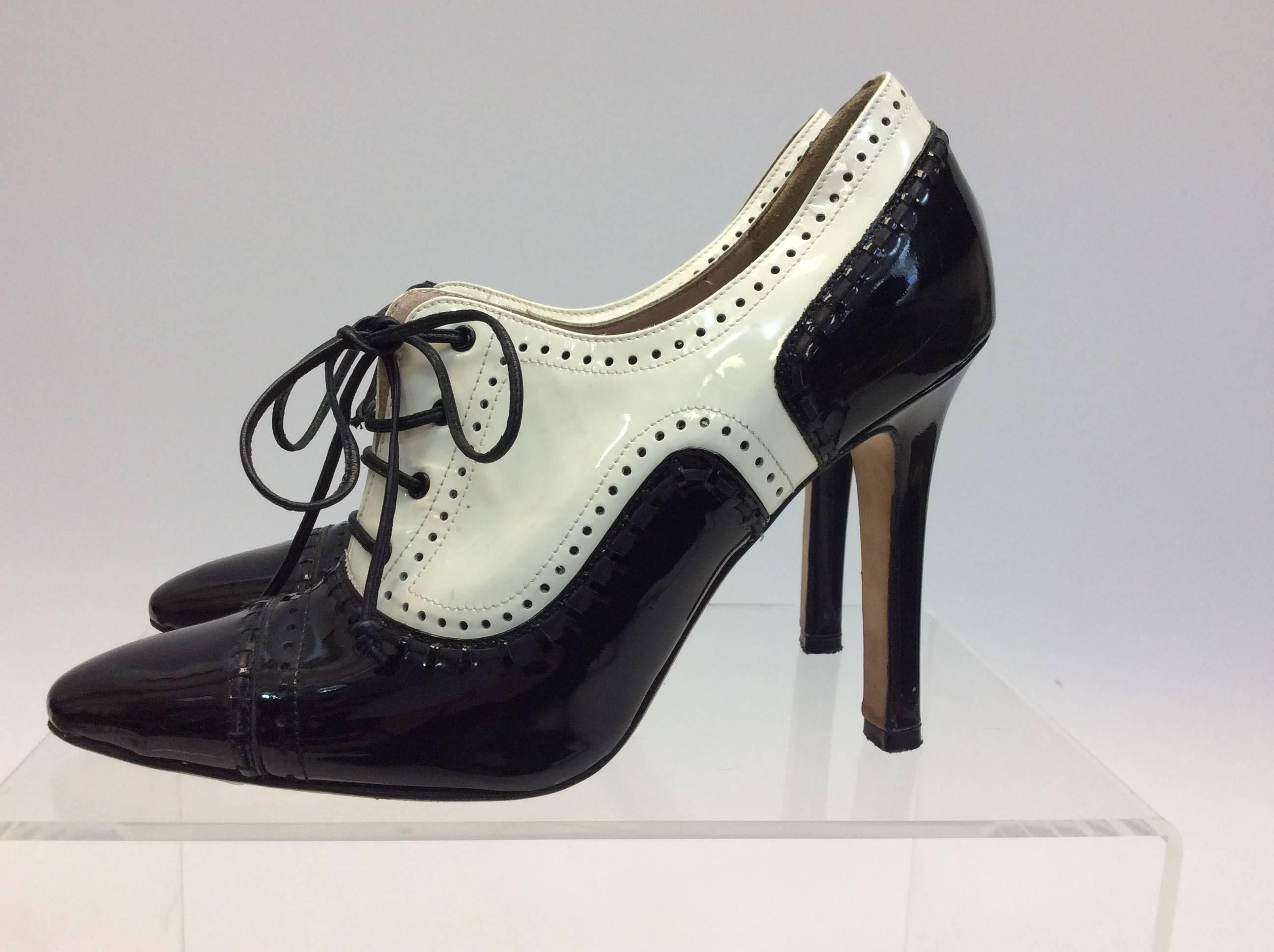 Manolo Blahnik Black and White Patent Oxford Heels
Patent Leather
$225
Size 36
4