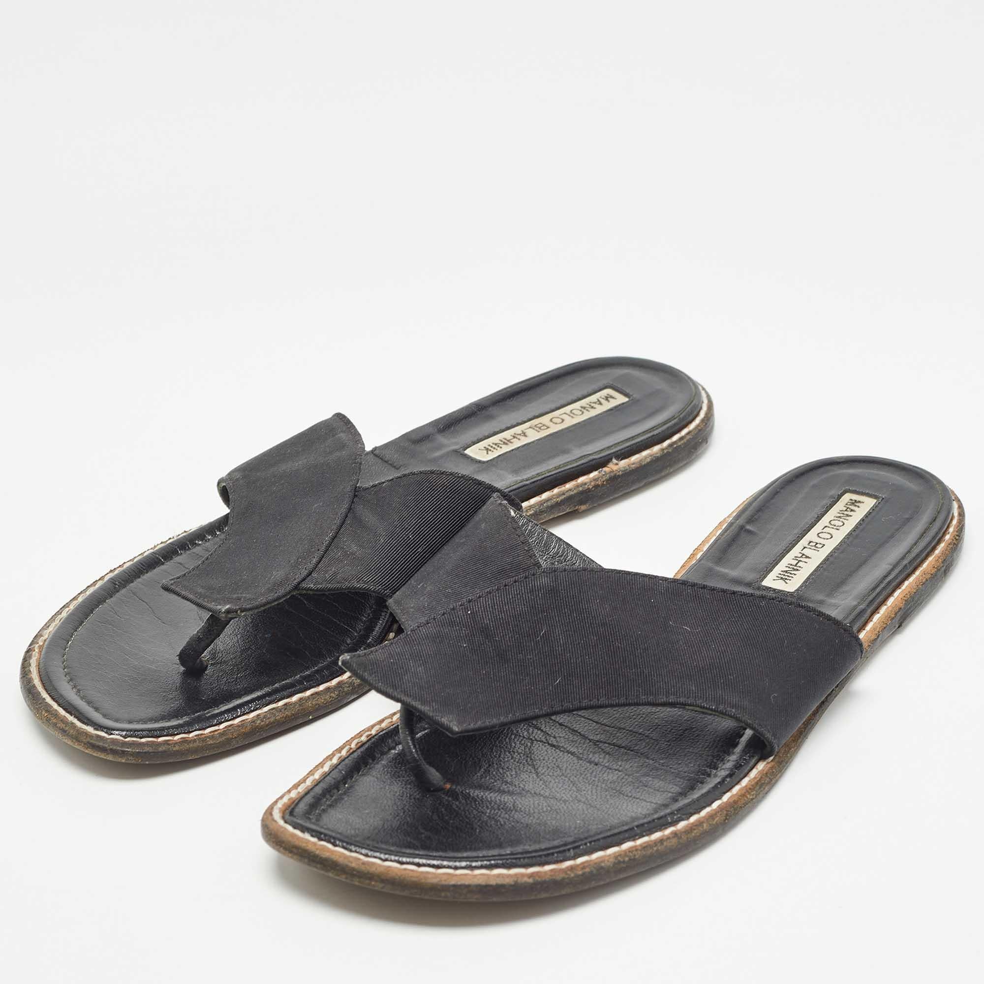 Enhance your casual looks with a touch of high style with these designer slides. Rendered in quality material with a lovely hue adorning its expanse this pair is a must have
