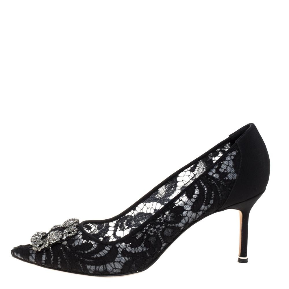 Walk with grace and confidence in these pumps by Manolo Blahnik. Styled in an elegant black shade, with dazzling embellishments on the pointed toes, and leather insoles to provide comfort, these luxurious lace pumps will never fail to lift your