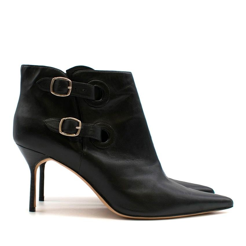 Manolo Blahnik Black Leather Ankle Boots 

- Pointed Toe 
- Buckle Up sides 
- Stiletto Heel 
- Smooth Black Leather Outer 
- Tone Stitching 
- Silver Tone Hardware 

Made in Italy 

Please note, these items are pre-owned and may show signs of being