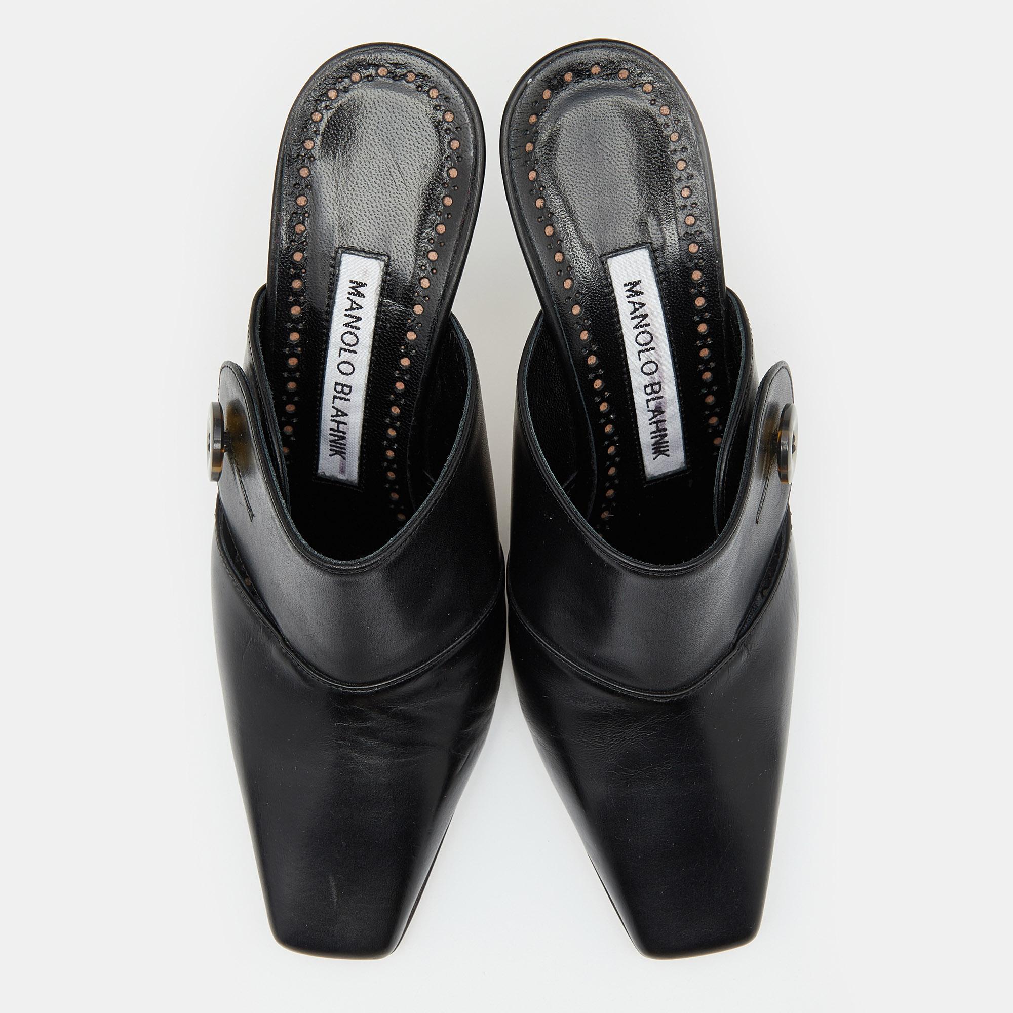 These Manolo Blahnik mules are super-chic and a must-have for your shoe collection. They are crafted from leather and feature comfy insoles and slender 8.5 cm heels. They'll look great with skinny jeans and a blouse.

