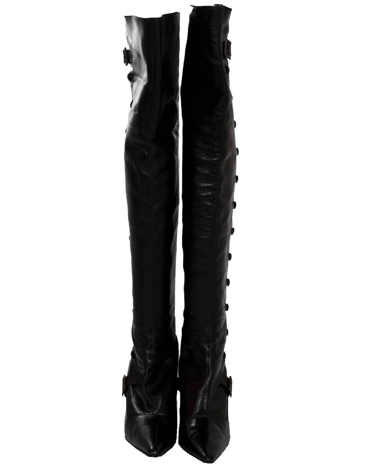 Manolo Blahnik Black Leather Over-The-Knee Boots Sz 37

Features stirrup detail and side buttons

Color: Black
Materials: Leather
Closure/Opening: Back zip closure
Sole Stamp: Manolo Blahnik 37
Overall Condition: Excellent pre-owned condition with