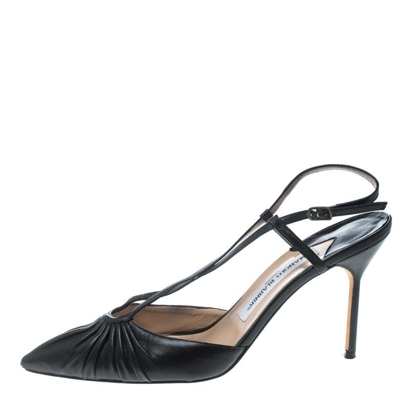 With a pair as gorgeous as this one, you are sure to shine all day long! These black Manolo Blahnik sandals are crafted from leather and feature pointed toes with a stylish pleat detailing and two cross straps that run from the middle up to the top