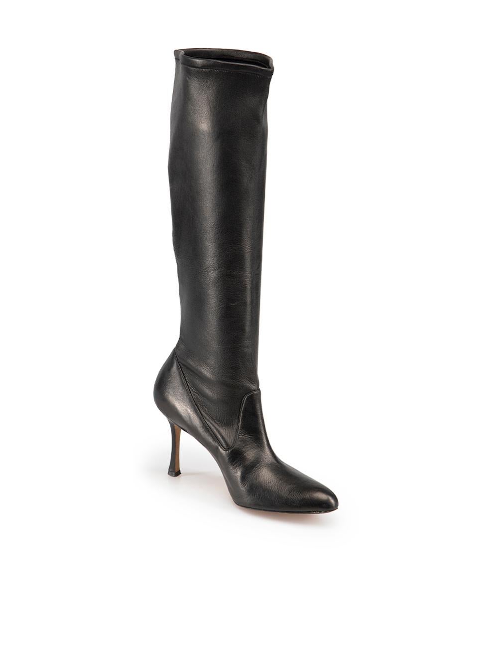 CONDITION is Very good. Minimal wear to boots is evident. Minimal wear to the heels of both boots with very light scratches to the leather on this used Manolo Blahnik designer resale item.

Details
Black
Leather
Knee high boots
Point toe
High