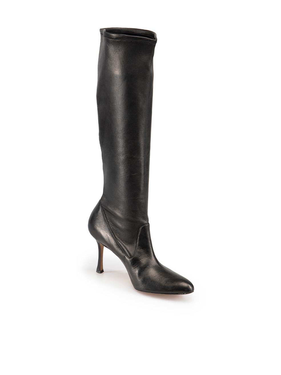 CONDITION is Very good. Minimal wear to boots is evident. Minimal wear to the heels of both boots with very light scratches to the leather on this used Manolo Blahnik designer resale item.
 
 Details
 Black
 Leather
 Knee high boots
 Point toe
 High