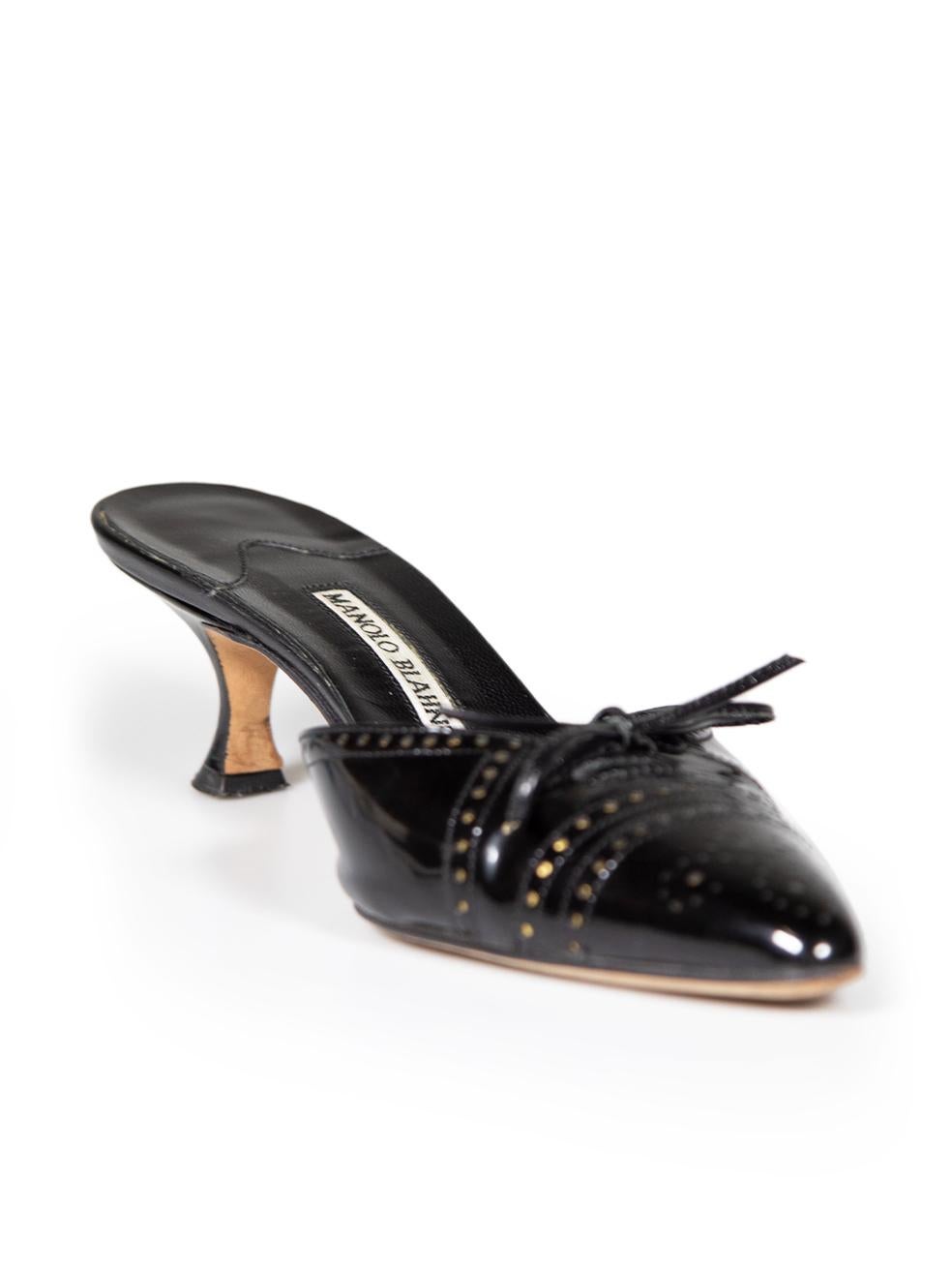 CONDITION is Very good. Minimal wear to mules is evident. Minimal abrasions to left side of left shoe and right side of right shoe on this used Manolo Blahnik designer resale item. This item comes with original dust bag.
 
 
 
 Details
 
 
 Black
 
