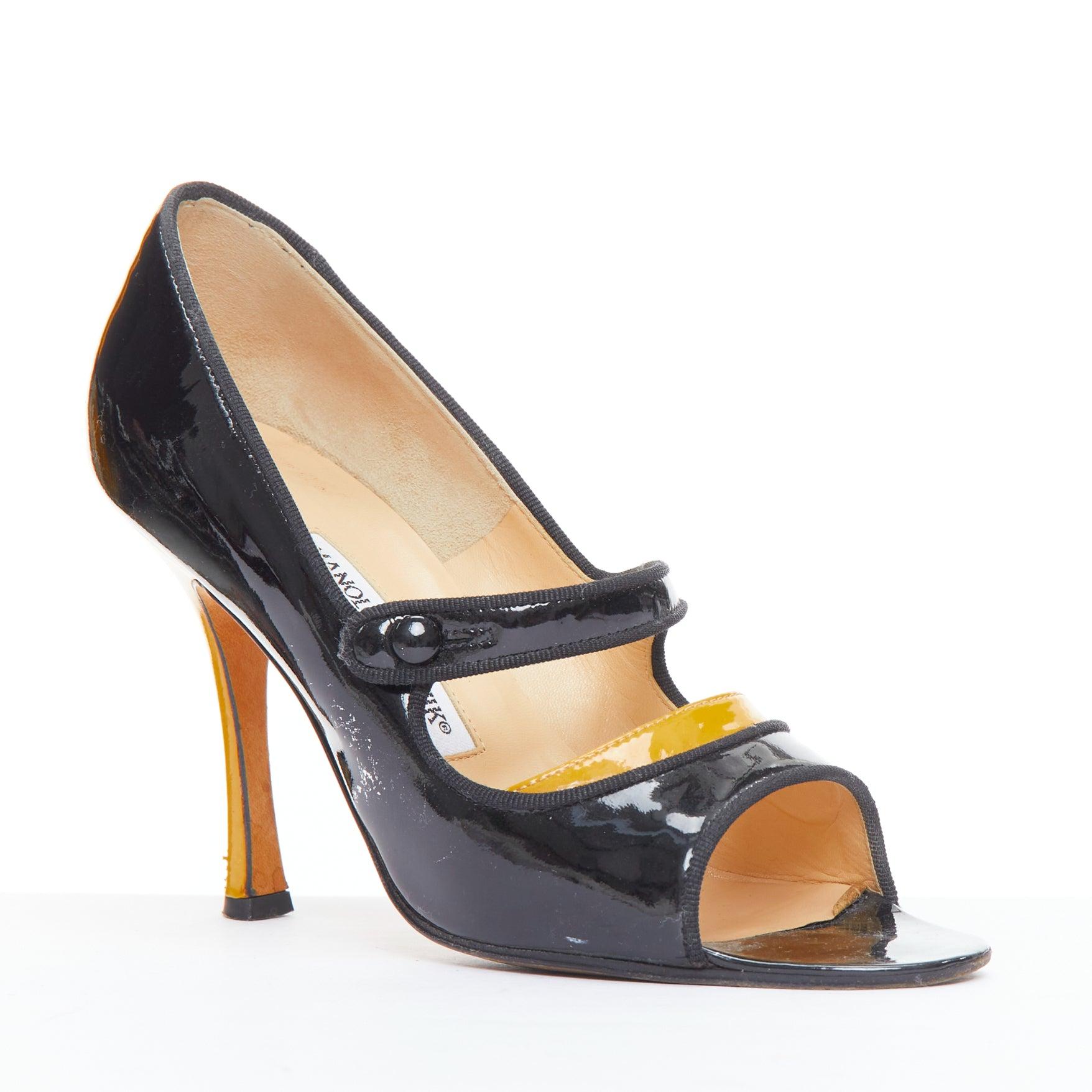 MANOLO BLAHNIK black patent leather nude panel peep heels EU37.5
Reference: LNKO/A02493
Brand: Manolo Blahnik
Material: Leather
Color: Black, Nude
Pattern: Solid
Closure: Button
Lining: Nude Leather
Extra Details: Spool heels.
Made in: