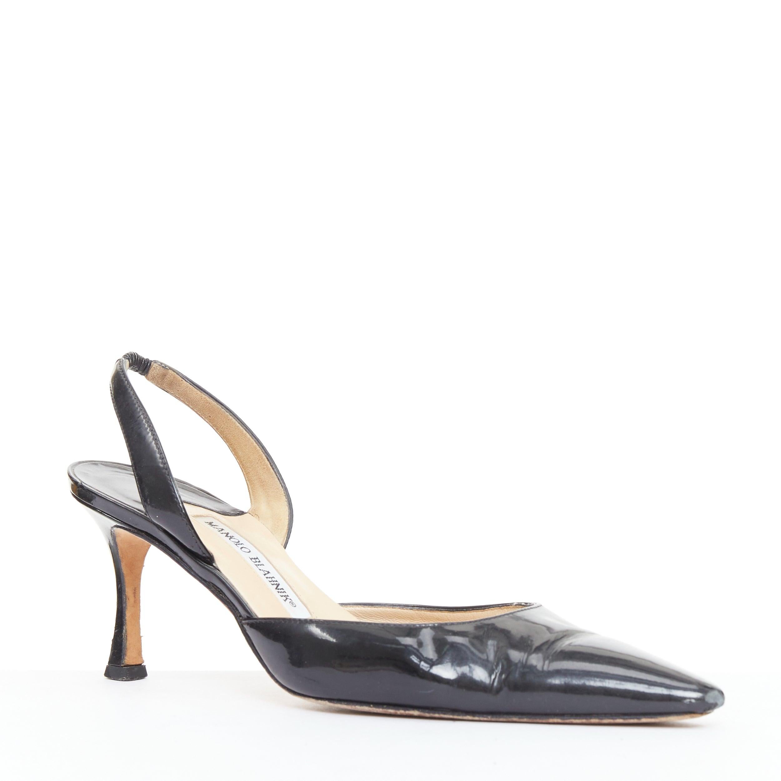 MANOLO BLAHNIK black patent pointed toe slingback dorsay heel EU39
Reference: JHDN/A00109
Brand: Manolo Blahnik
Material: Patent Leather
Color: Black
Pattern: Solid
Closure: Slingback
Lining: Nude Leather
Made in: Italy

CONDITION:
Condition: Fair,