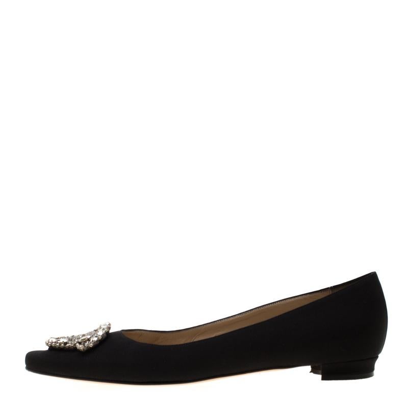 You know you are going to have a glamorous day the moment you put these ballet flats on. They are a Manolo Blahnik creation, meticulously crafted from satin and lined with leather on the insoles. The pair carries a classic black hue and
