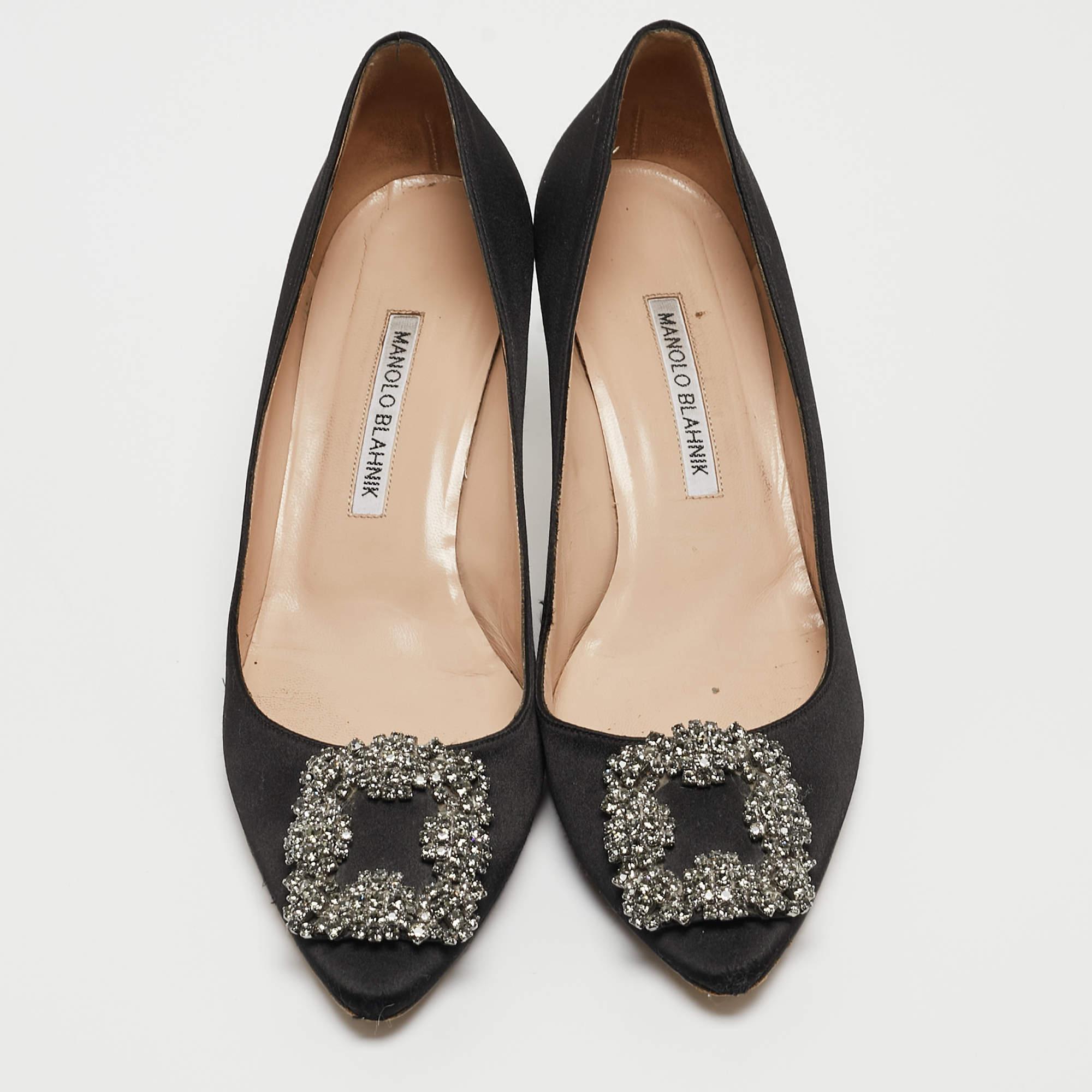 Manolo Blahnik is well-known for his graceful designs, and his label is synonymous with opulence, femininity, and elegance. These Hangisi pumps are crafted from satin into a pointed-toe silhouette augmented by the embellishments perched on the