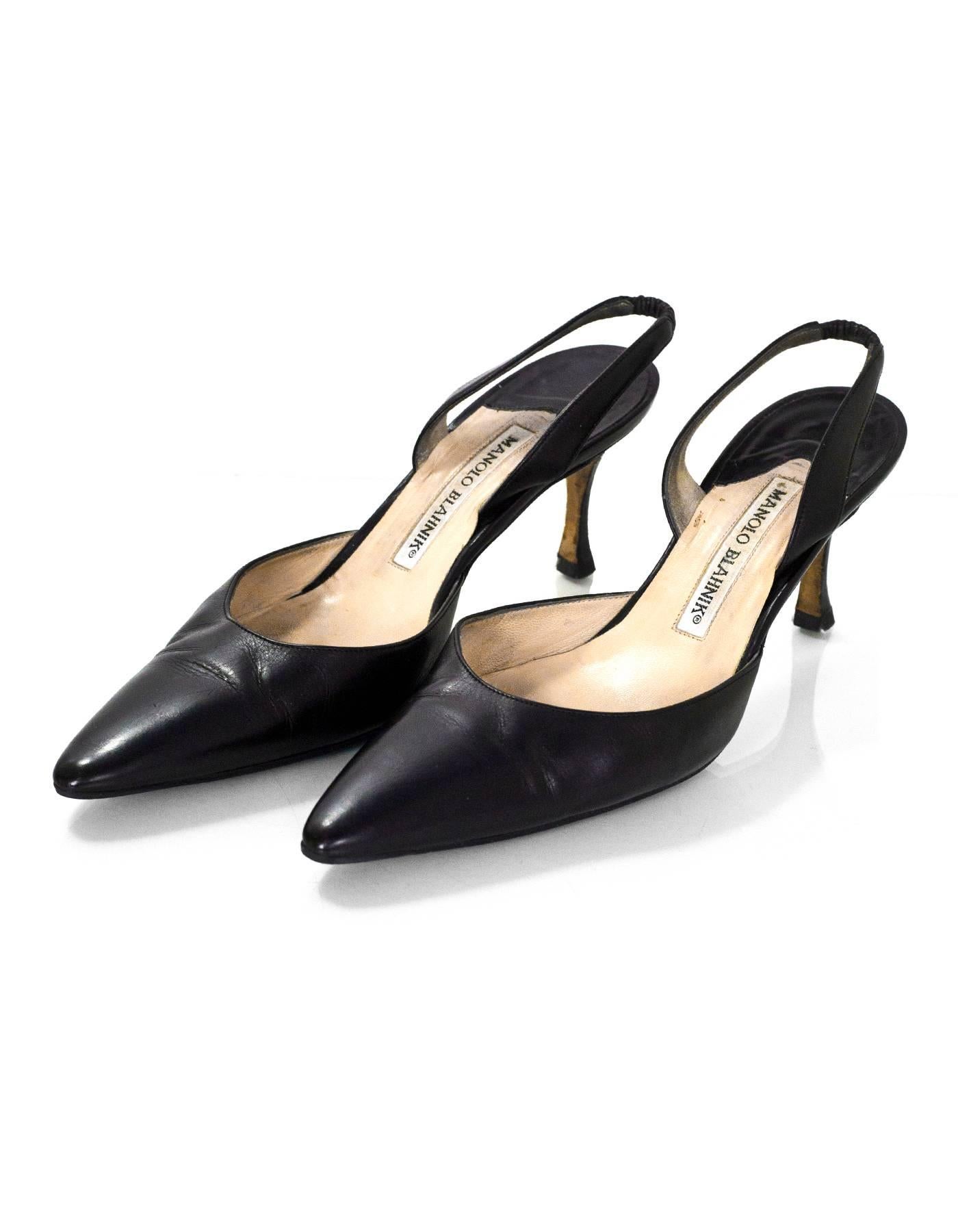 Manolo Blahnik Black Slingback Pumps Sz 36

Made In: Italy
Color: Black
Materials: Leather
Closure/Opening: Sling back
Sole Stamp: Manolo Blahnik Made in Italy 36
Overall Condition: Very good pre-owned condition with the exception of wear and