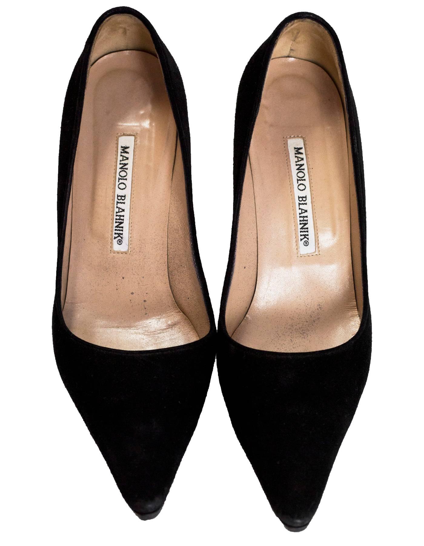 Manolo Blahnik Black Suede Pumps Sz 37.5

Made In: Italy
Color: Black
Materials: Suede
Closure/Opening: Slide on
Sole Stamp: Manolo Blahnik Made in Italy 37.5
Overall Condition: Excellent pre-owned condition with the exception of light wear at