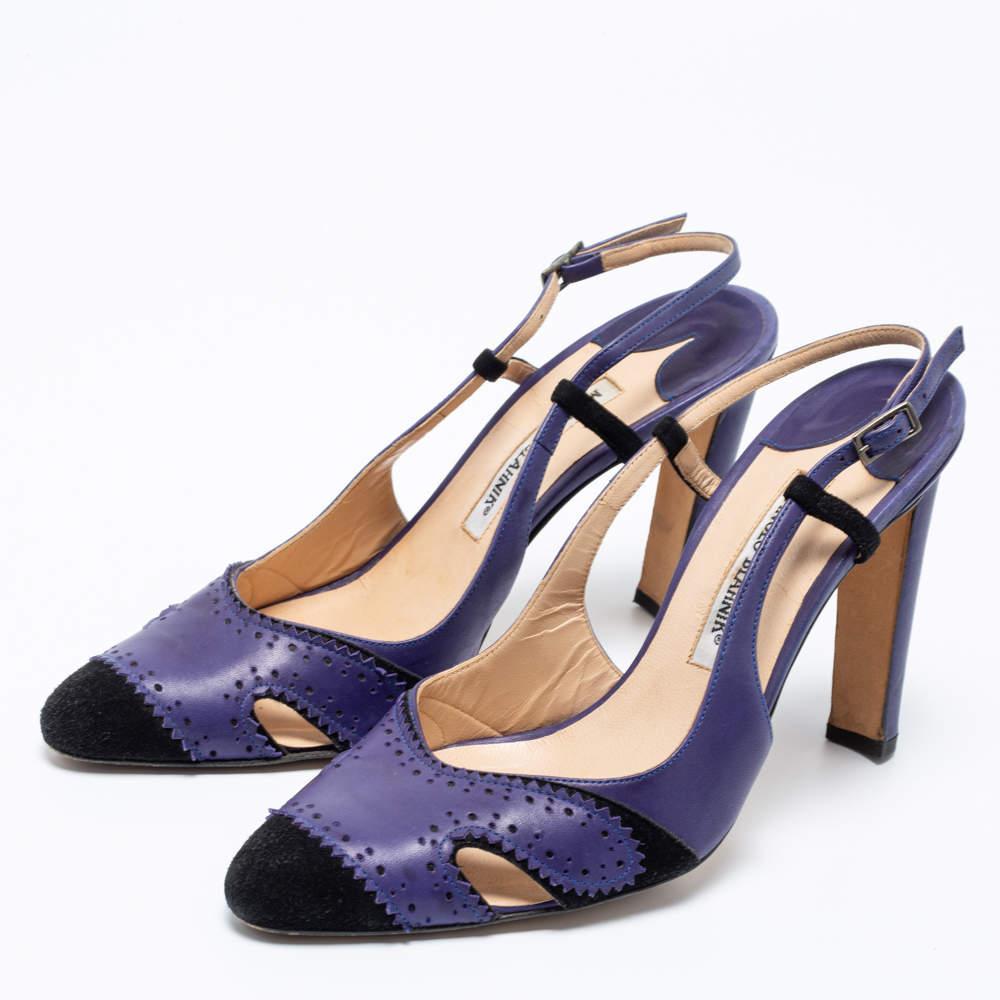 These Barrie Spectator sandals from Manolo Blahnik are all you need to flaunt a stylish look for the day Made from blue black leather and suede on the exterior these sandals feature a slingback silver tone hardware and 11 cm heels. Revamp your