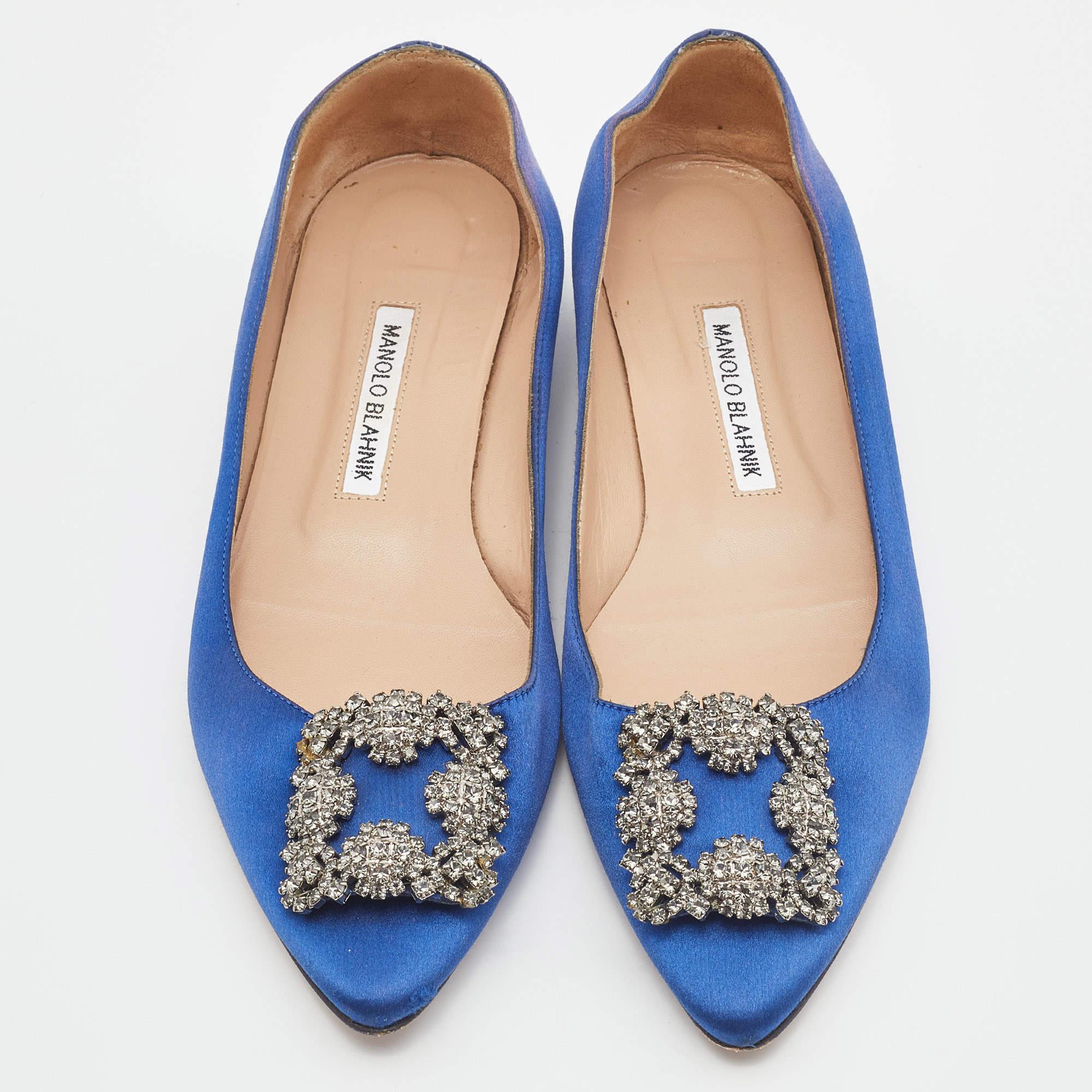 You know you are going to have a glamorous day the moment you put these ballet flats on. They are a Manolo Blahnik creation, meticulously crafted from satin and lined with leather on the insoles. The pair carries a classic blue hue and embellishment