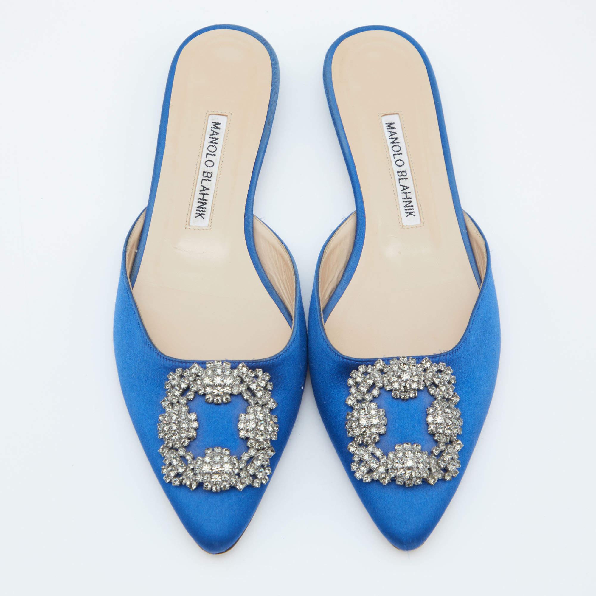 Designed for go-getters, these mules are made for everyday use so that you can be a stylish achiever each day. Be it any occasion, they will match any outfit like a dream. They are decorated with an appealing crystal embellishment on the uppers and