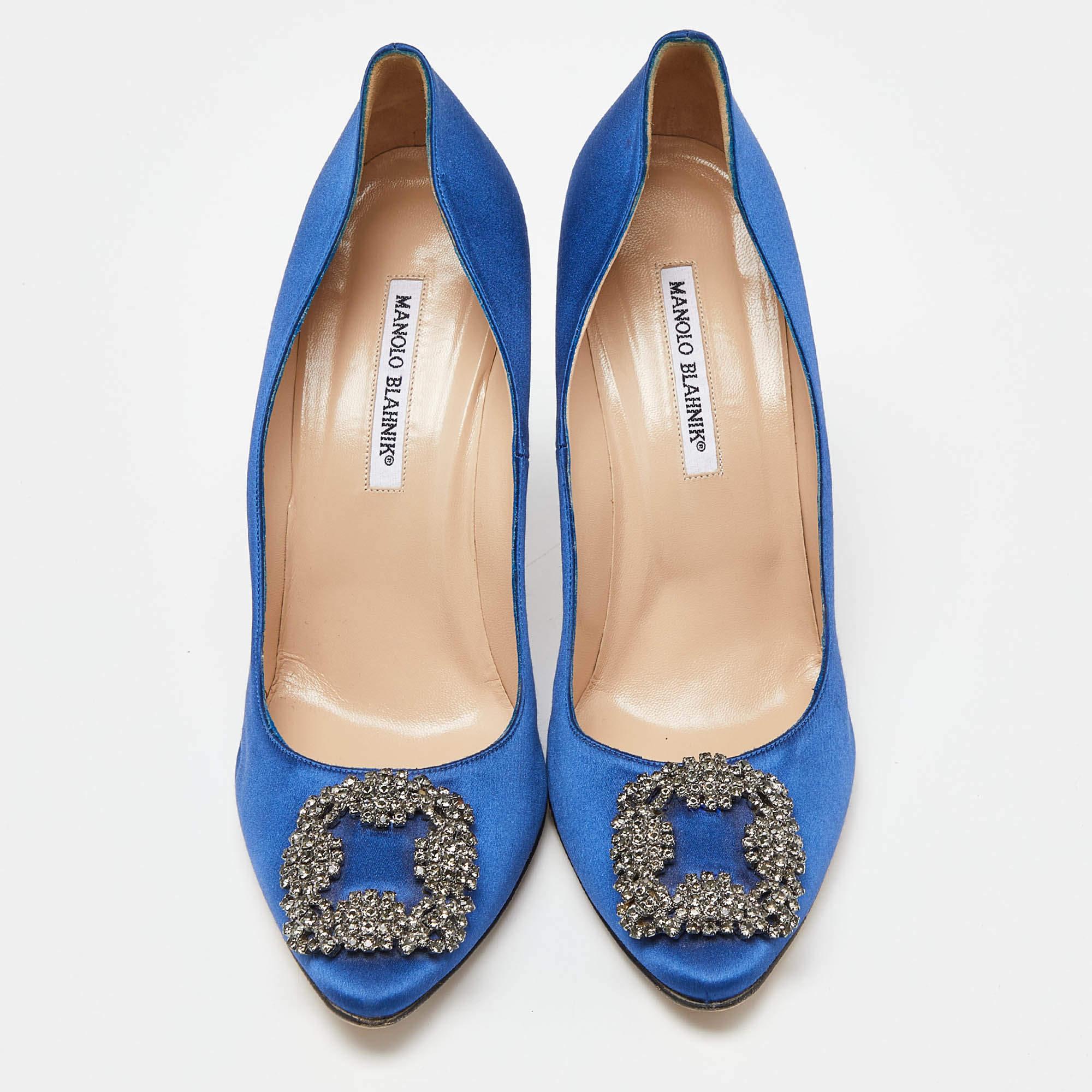 Manolo Blahnik is well-known for designs that embody opulence, femininity, and elegance. Carrying the same traits, these Hangisi pumps come crafted from satin into a covered-toe silhouette augmented by the embellishments perched on the uppers. They