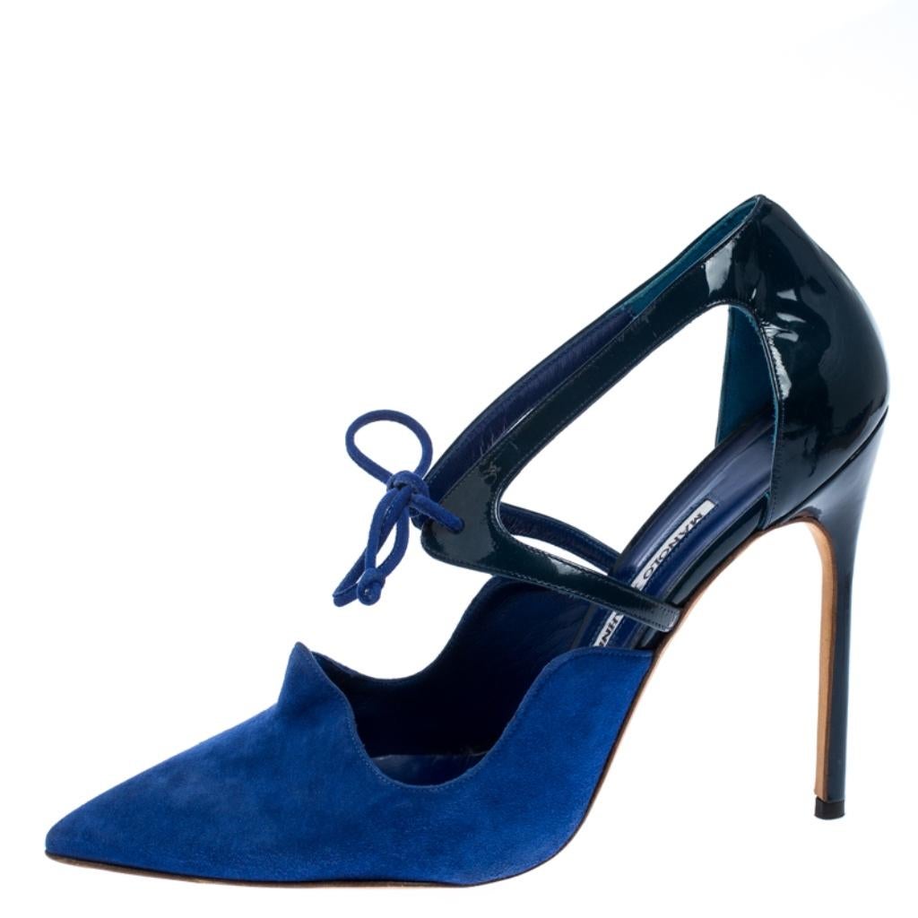 The epitome of comfort and class, this pair of pumps by Manolo Blahnik is ideal for an evening out. They are crafted from suede and patent leather featuring pointed toes, tie-up at the ankles and high stiletto heels. Match your ensemble with these