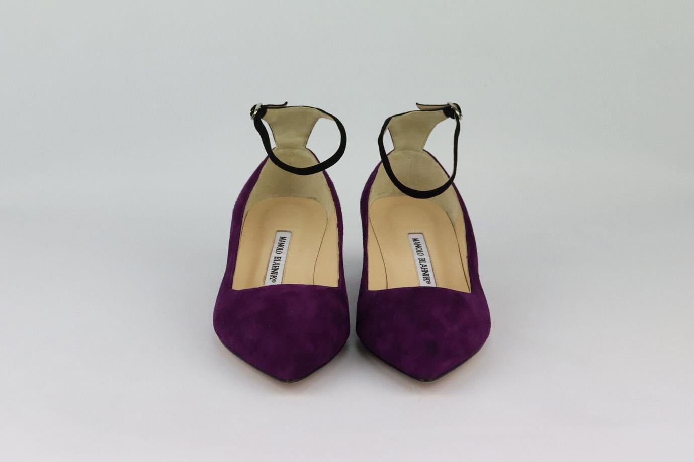 These pumps by Manolo Blahnik are a classic style that will never date, made in Italy from supple black and purple suede, they have pointed toes, ankle strap and comfortable 38 mm block heel to take you from morning meetings to dinner with friends.