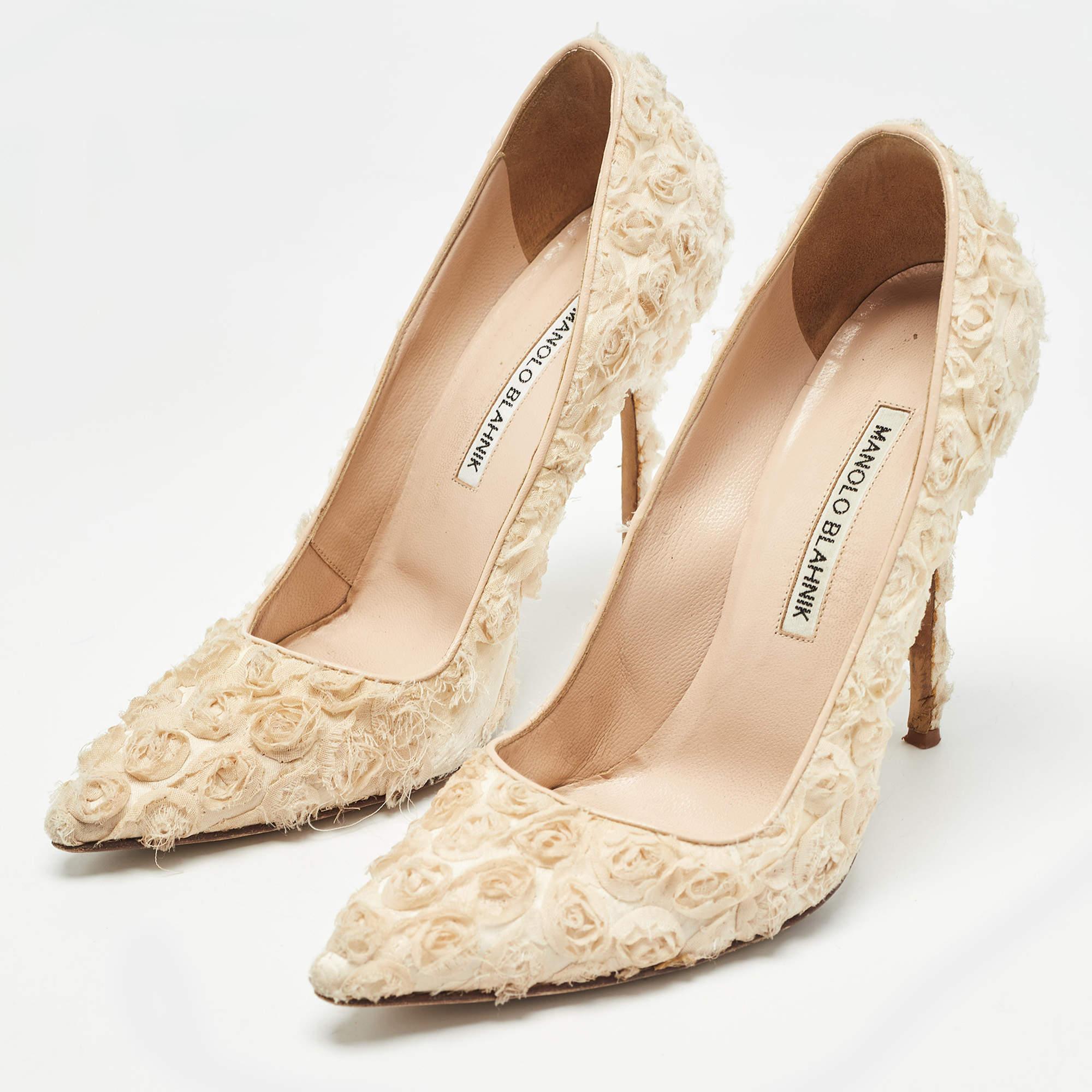 Make a chic style statement with these designer pumps. They showcase sturdy heels and durable soles perfect for your fashionable outings