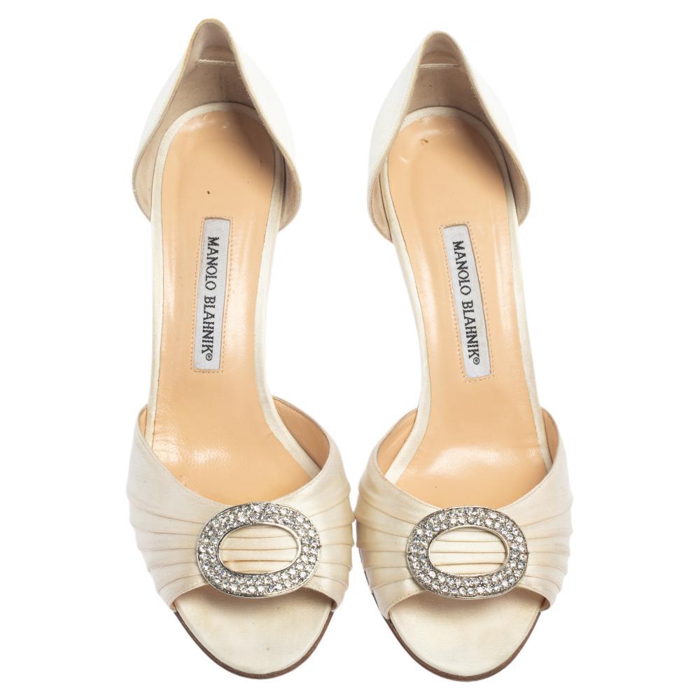 Clean-cut and built for the comfort of your feet, Manolo Blahnik's Sedaraby pumps embody a classic style with a contemporary touch. Designed as a peep-toe, they've been meticulously crafted from satin. But what makes the number stand out is the