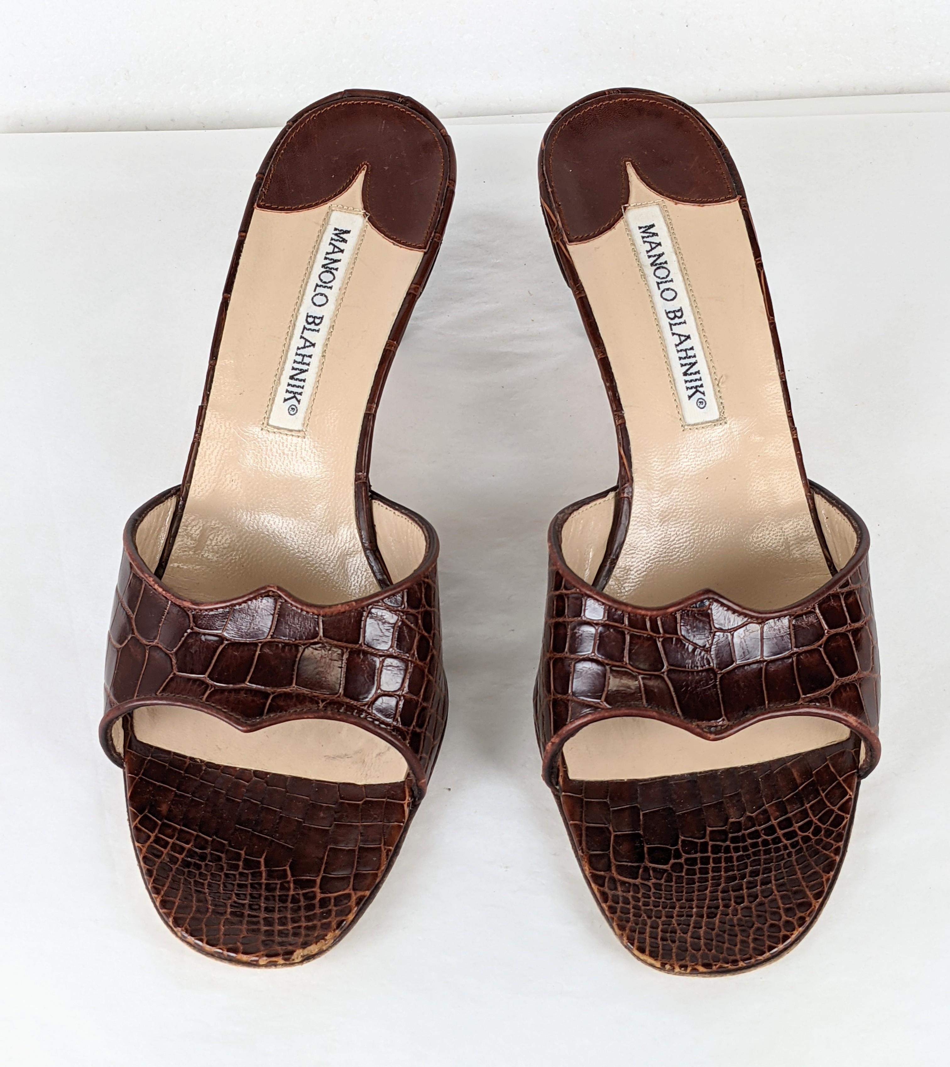 Elegant and timeless Manolo Blahnik Brown Crocodile Mules with pointed edge detailing. Heel 2.25
