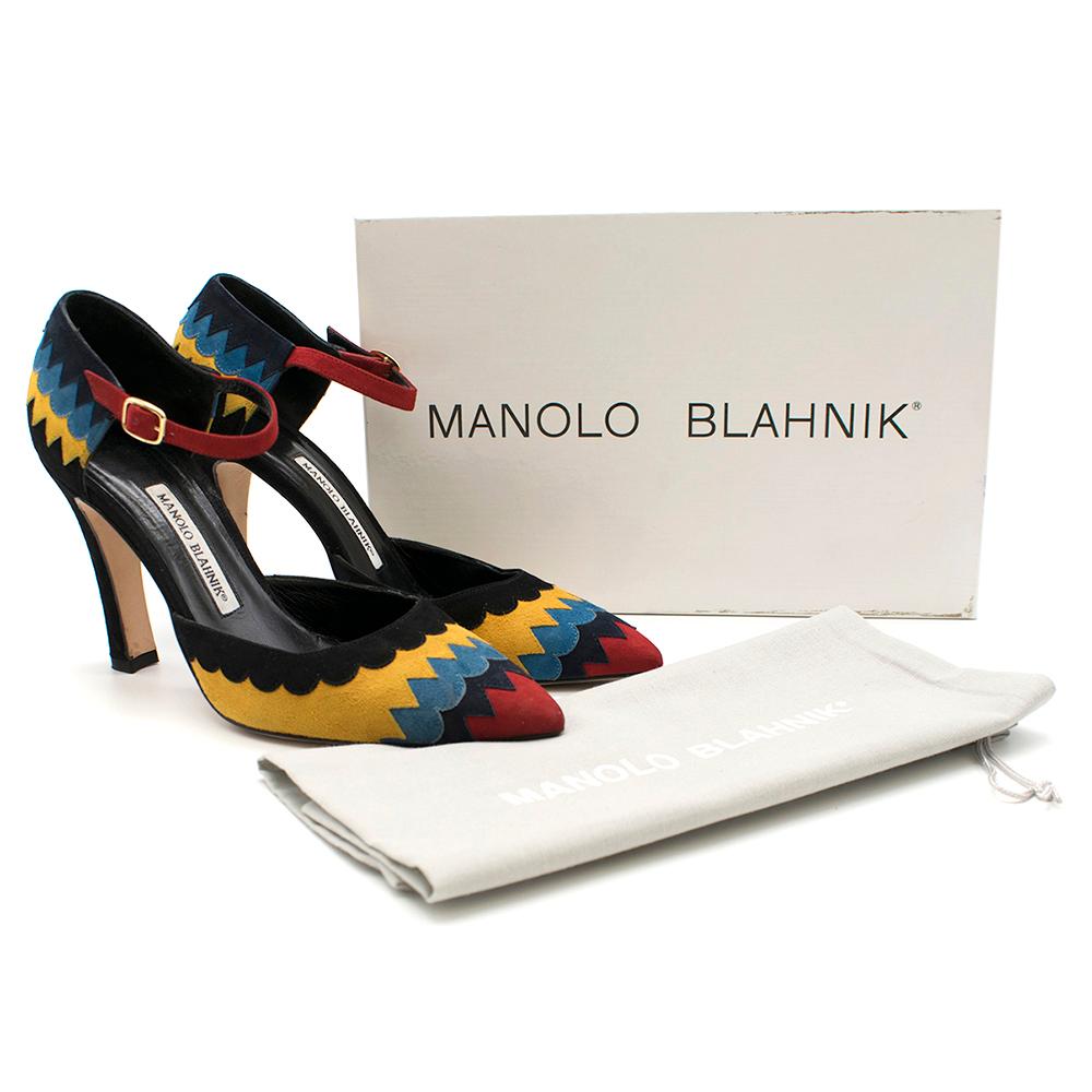Manolo Blahnik Encaje Suede Ankle Strap Pump

Topstitched scalloped suede calfskin layers creates layered colorblock upper
Pointed toe
Adjustable red ankle strap with gold-tone buckle hardware
Covered backstay
Slight block covered heel
Padded