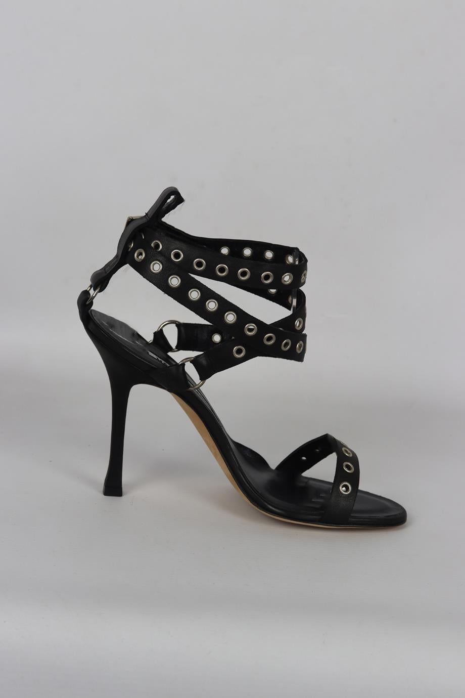 Manolo Blahnik eyelet embellished leather sandals. Black. Buckle fastening at side. Does not come with dustbag or box. Size: EU 37 (UK 4, US 7). Heel Height: 3 in. Insole: 9.1 in. New without box