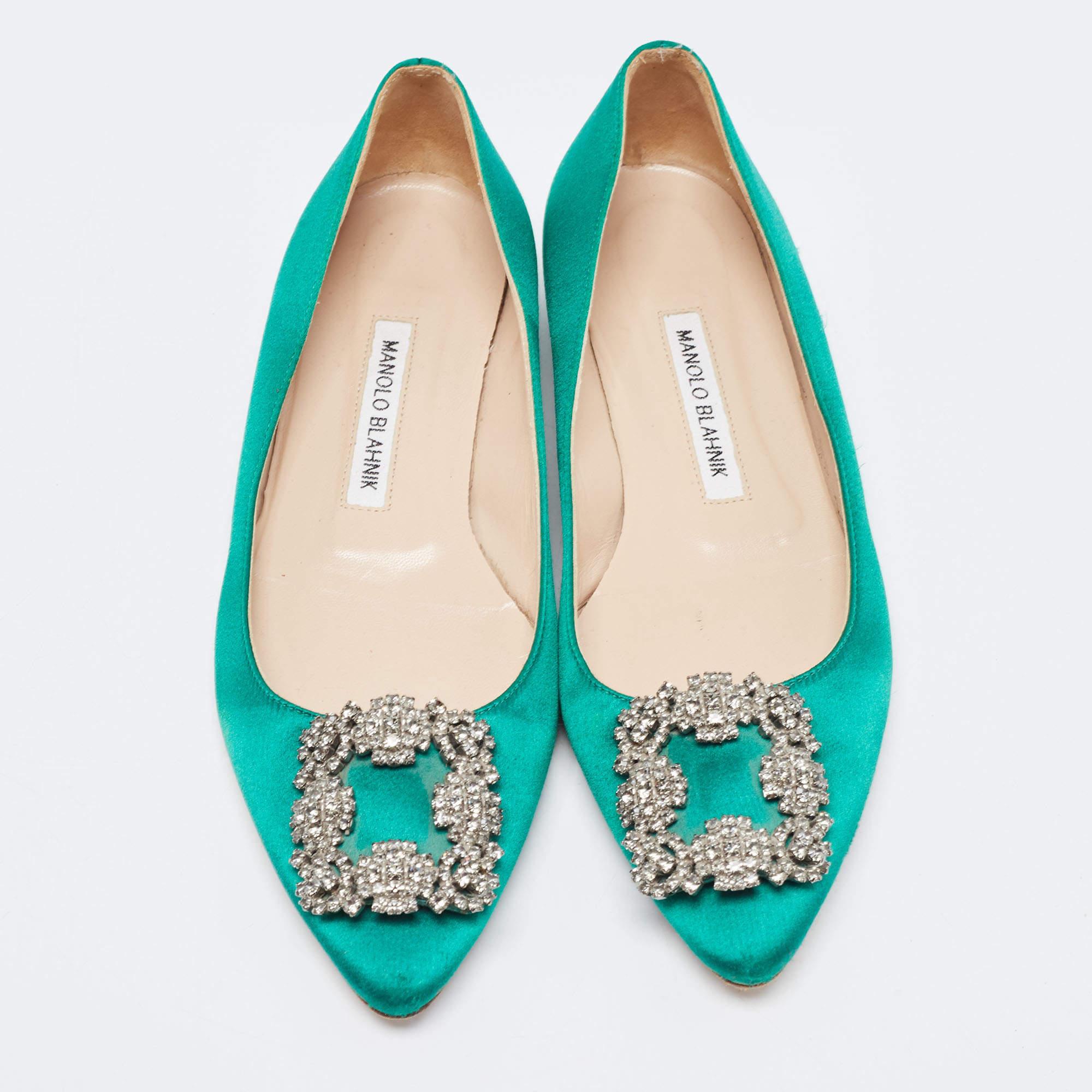 You know you are going to have a glamorous day the moment you put these ballet flats on. They are a Manolo Blahnik creation, meticulously crafted from satin and lined with leather on the insoles. The pair carries a classic blue hue and