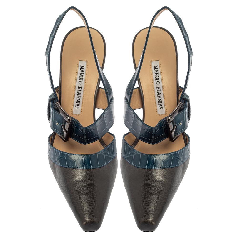 A beautiful pair of Manolo Blahnik shoes that's easy to wear and flaunt, these sandals are highly versatile. Constructed in leather, these shoes feature pointed toes, croc embossing, buckle strap, slingback closure, and 9.5 cm heels for an elegant