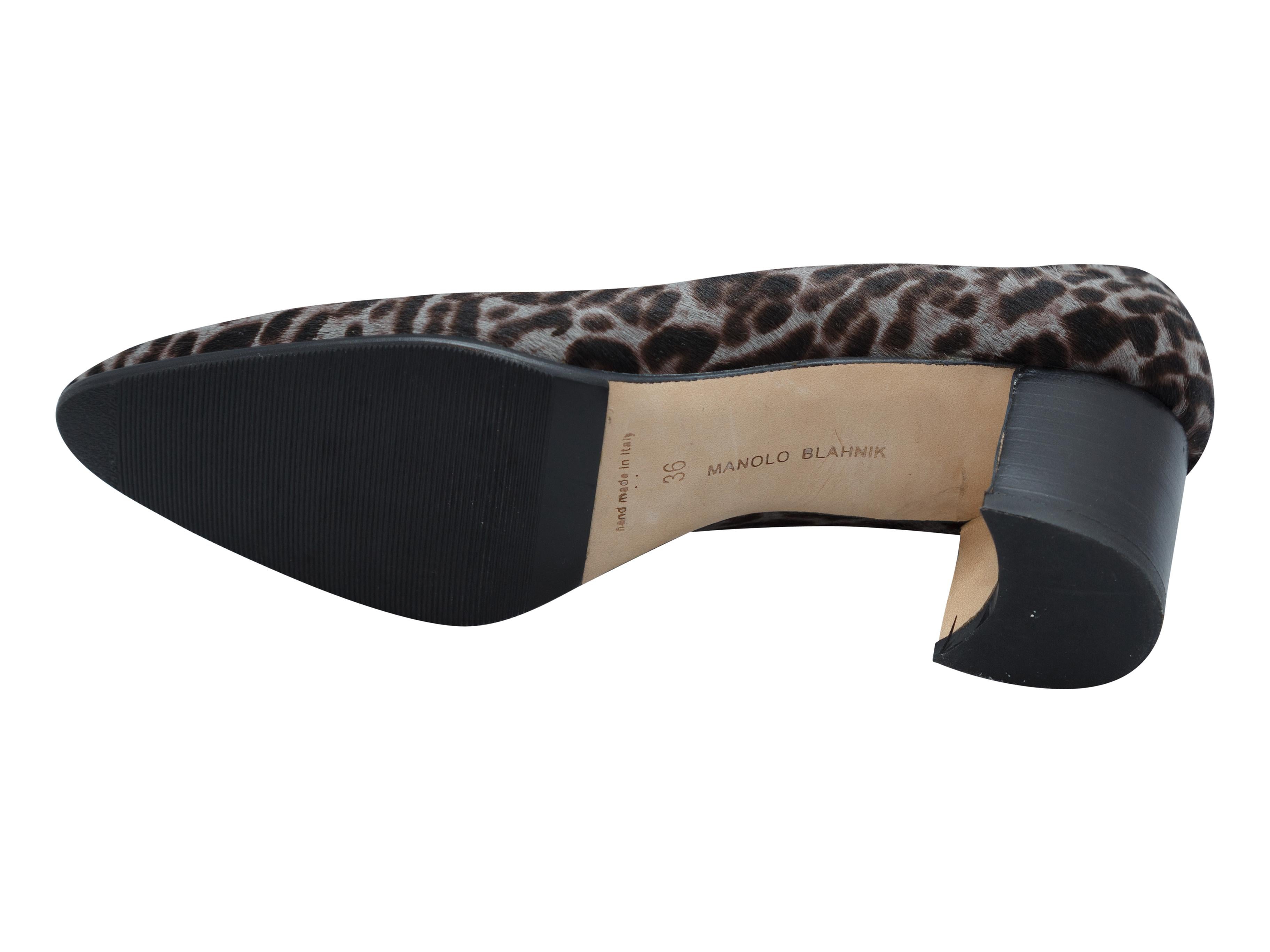 Product details: Grey and brown leopard print ponyhair pumps by Manolo Blahnik. Slip-on style. Block heels. Designer size 36. 2.13