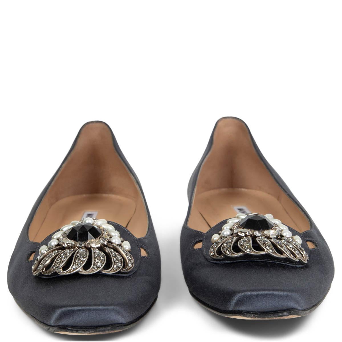 100% authentic Manolo Blahnik ballet flats in charcoal satin embellished with pearls, chrystals and a black stone. Have been worn and are in excellent condition. 

Measurements
Imprinted Size	39
Shoe Size	39
Inside Sole	26cm (10.1in)
Width	8cm
