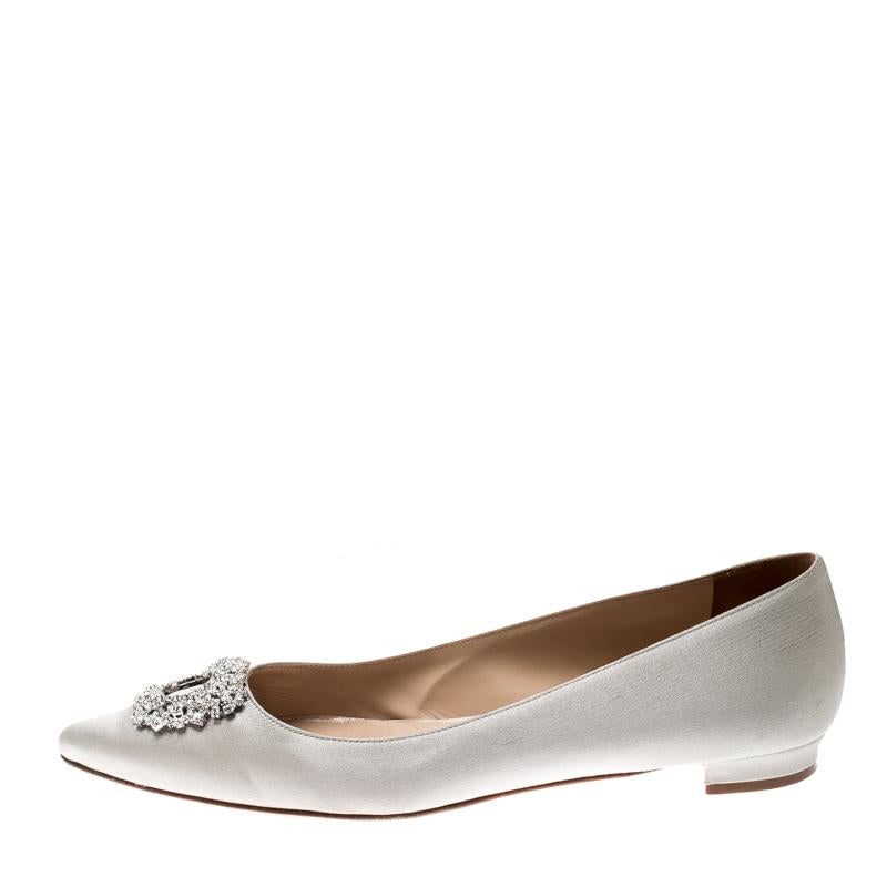 You know you are going to have a glamorous day the moment you put these ballet flats on. They are a Manolo Blahnik creation, meticulously crafted from satin and lined with leather on the insoles. The pair carries a classic grey hue and