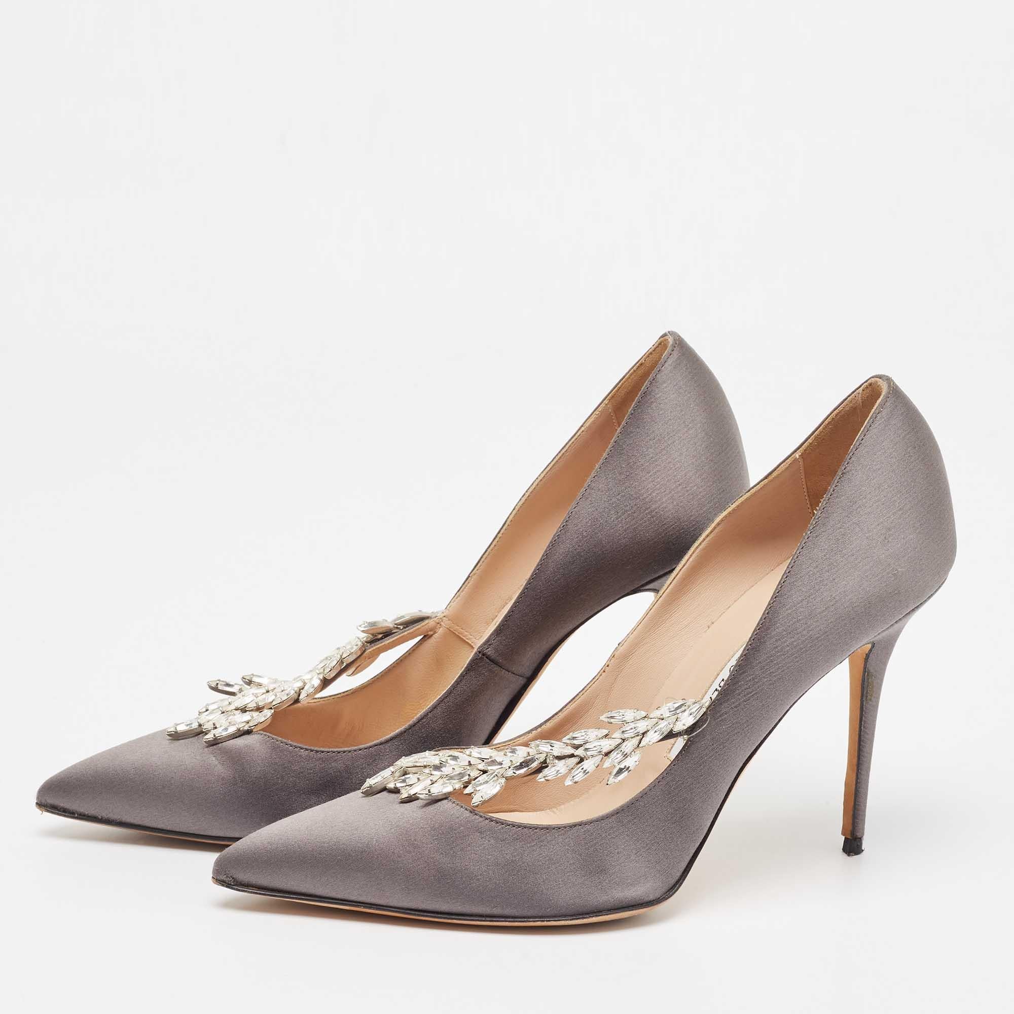 Crafted in a classy hue, we love these Manolo Blahnik grey pumps. Designed to make a statement, they have a sleek silhouette and a nice fit. Wear yours under maxi skirts for a peek of glamour, or let them shine with cropped hemlines.

