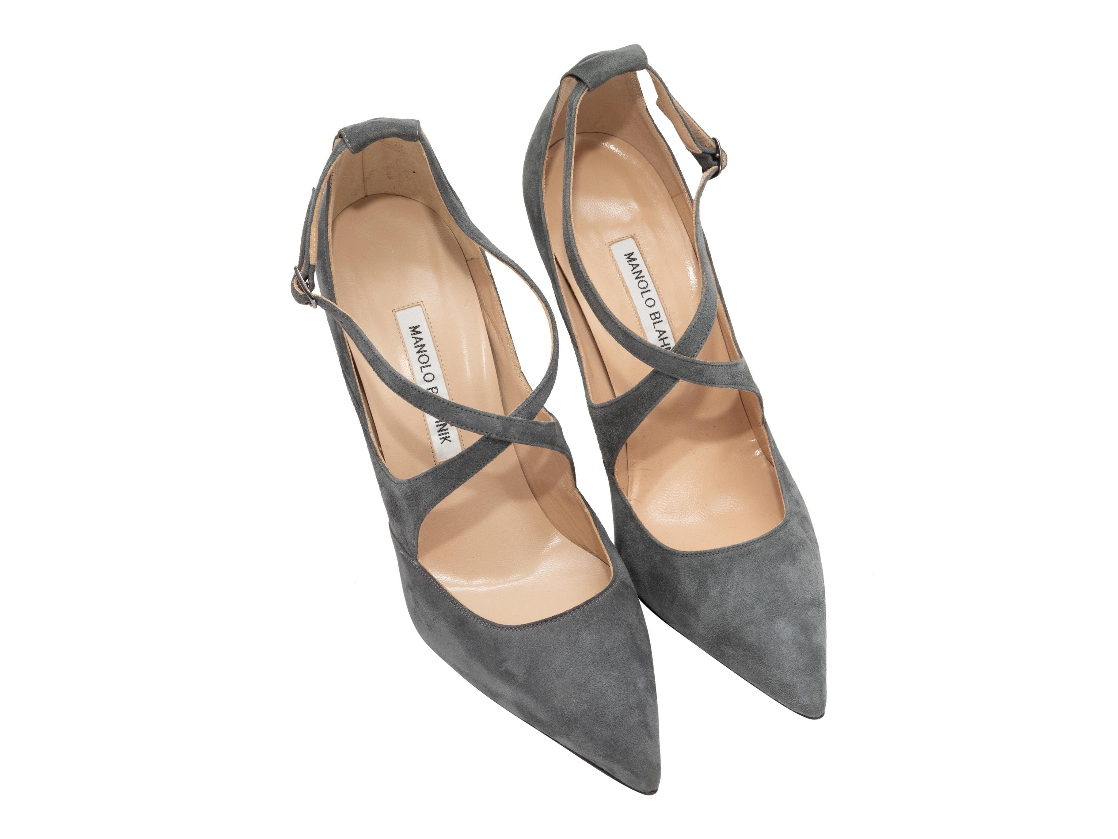 Product Details: Grey suede pointed-toe criss-cross pumps by Manolo Blahnik. Buckle closures at ankle straps. 4