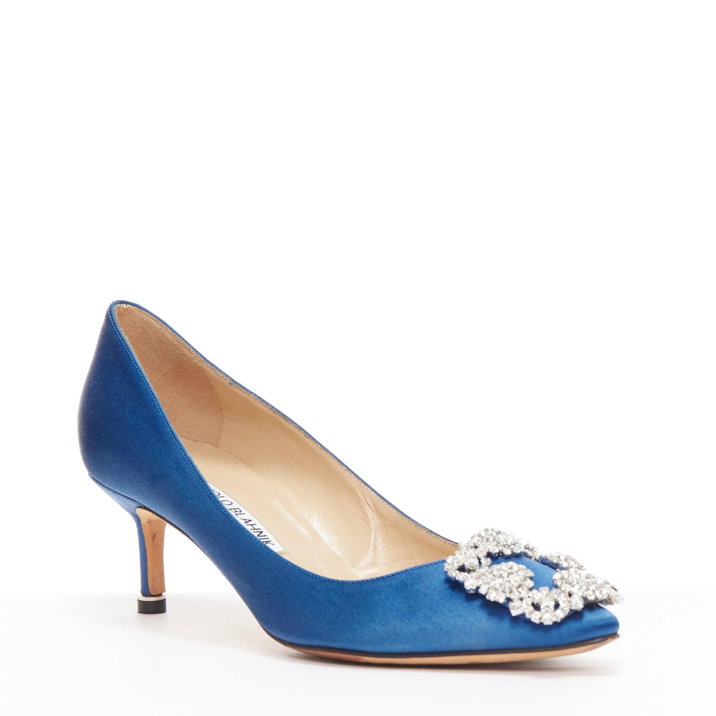MANOLO BLAHNIK Hangisi 50 blue satin crystal buckle teacup heeled pumps EU36.5
Reference: KYCG/A00043
Brand: Manolo Blahnik
Model: Hangisi 50
Material: Satin
Color: Silver, Blue
Pattern: Crystals
Closure: Slip On
Lining: Nude Leather
Made in: