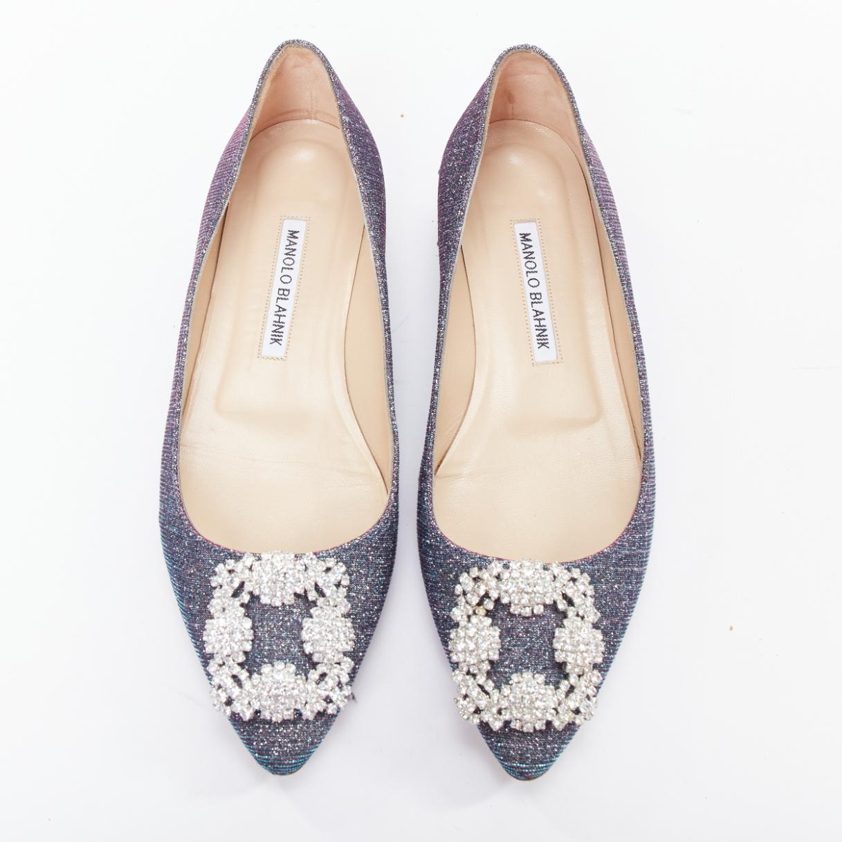 MANOLO BLAHNIK Hangisi purple glitter fabric strass buckle pointy flats EU37
Reference: KYCG/A00063
Brand: Manolo Blahnik
Model: Hangisi
Material: Fabric
Color: Purple, Silver
Pattern: Solid
Closure: Slip On
Lining: Nude Leather
Extra Details: