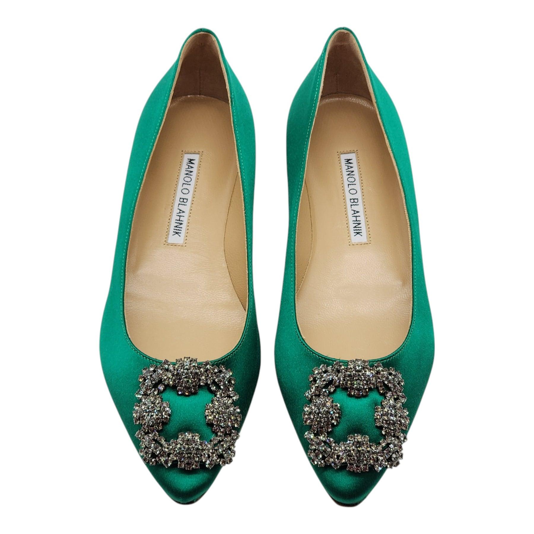 Green satin almond toe flat pumps finished with a square crystal buckle encased in a gunmetal frame.

Notes from Blahnik: 