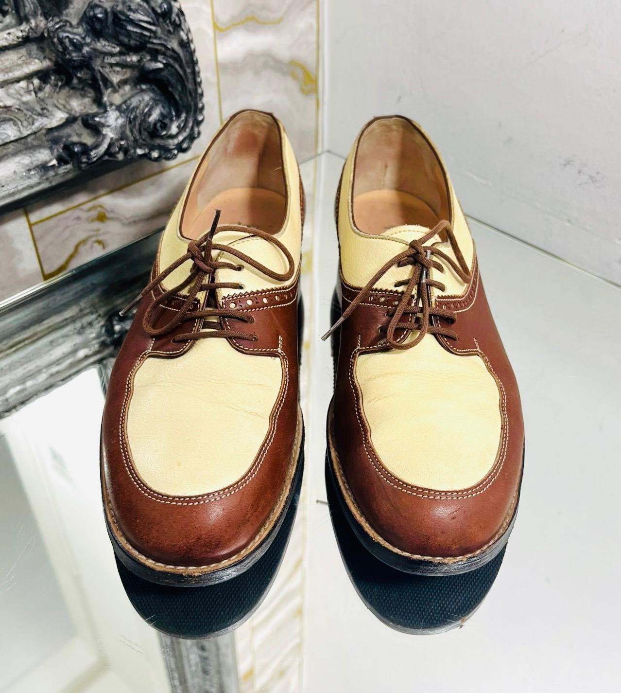 Manolo Blahnik Leather Brogues

Brown lace-up shoes designed with ivory inserts and decorative perforation details.

Featuring round toes and leather lining and insoles.

Size – 40

Condition – Fair (Some scratches and discolorations, general signs