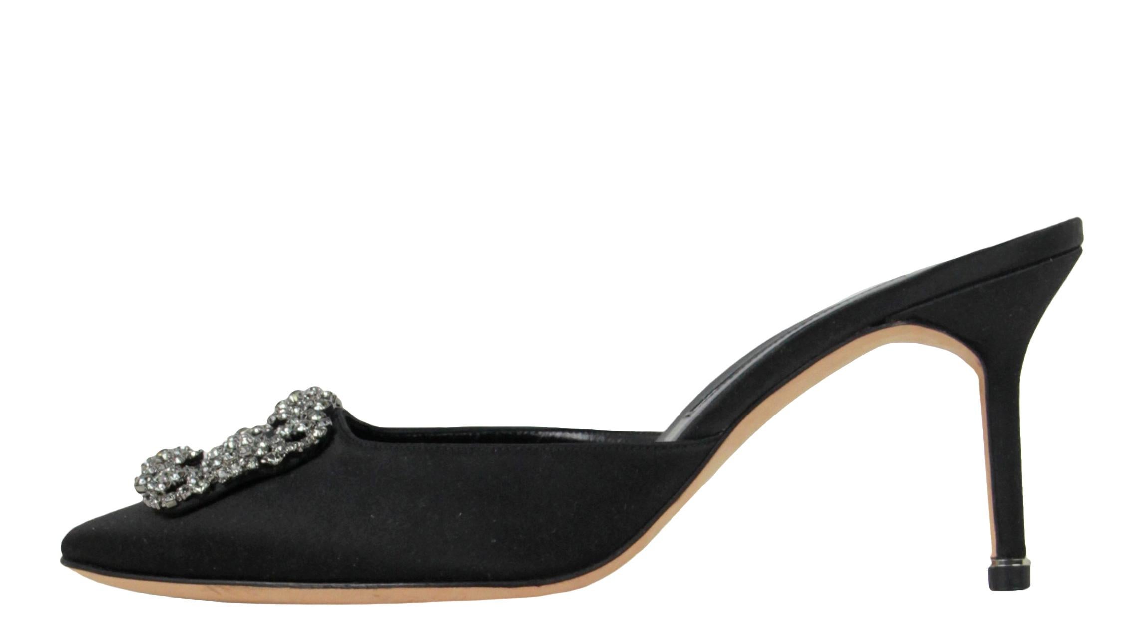 Manolo Blahnik Black Satin Hangisimu Satin Mule sz 39.5

Made In: Italy
Color: Navy
Hardware: Silvertone
Materials: Satin, metal, crystals
Closure/Opening: Slip on
Overall Condition: Like new. Does not include box or dustbags
Estimated Retail: