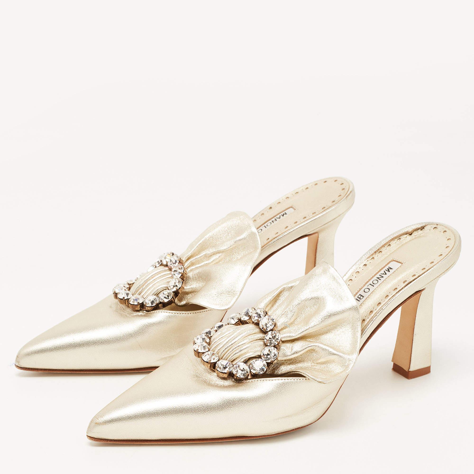 The ease of slipping into your shoes as you head out and taking them off once you're home is elevated with mules. These Manolo Blahnik mules for women bring the same comfort, with a lot of style.

