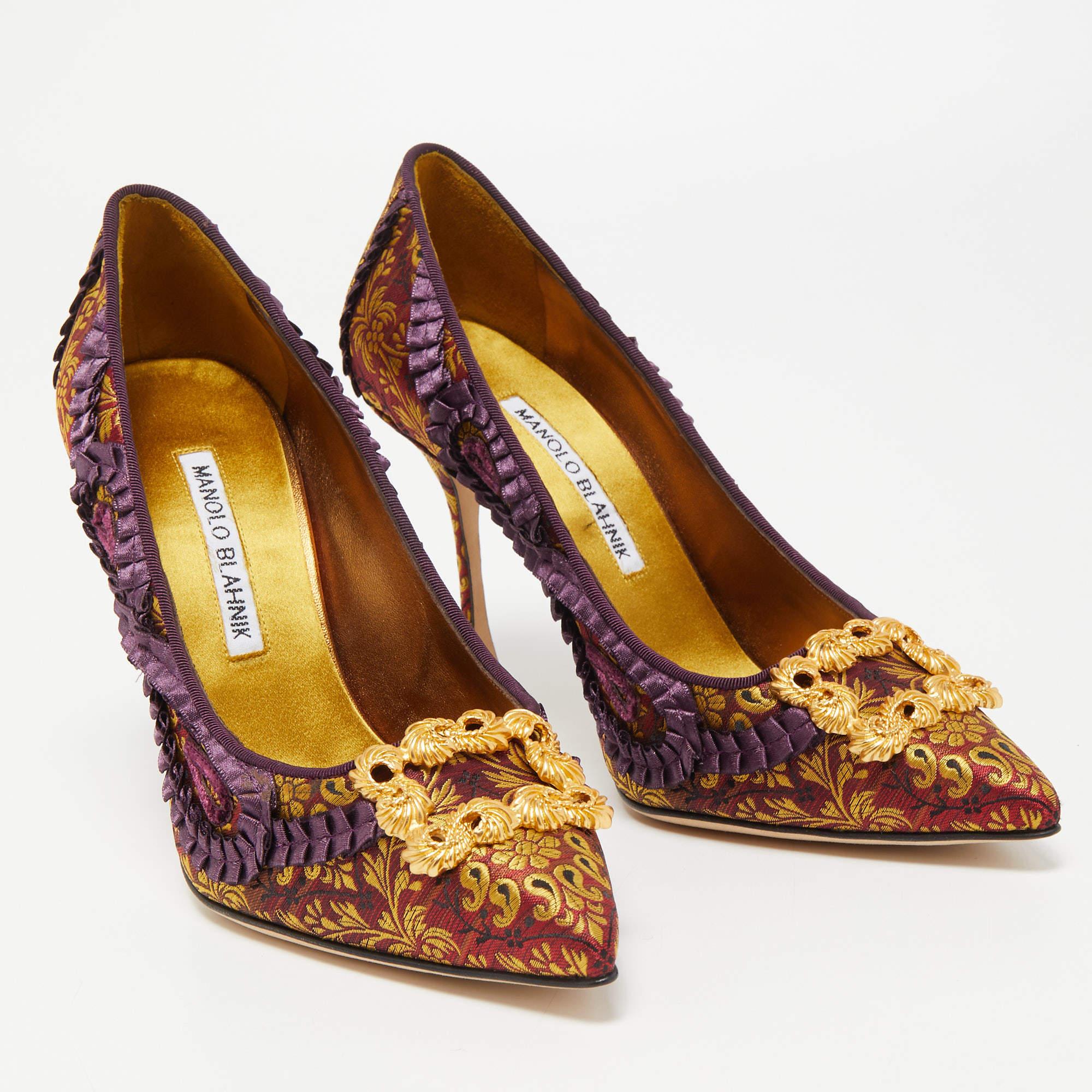 Manolo Blahnik is well-known for his graceful designs, and his label is synonymous with opulence, femininity, and elegance. These Hangisi pumps are crafted from brocade fabric into a pointed-toe silhouette augmented by the embellishments perched on