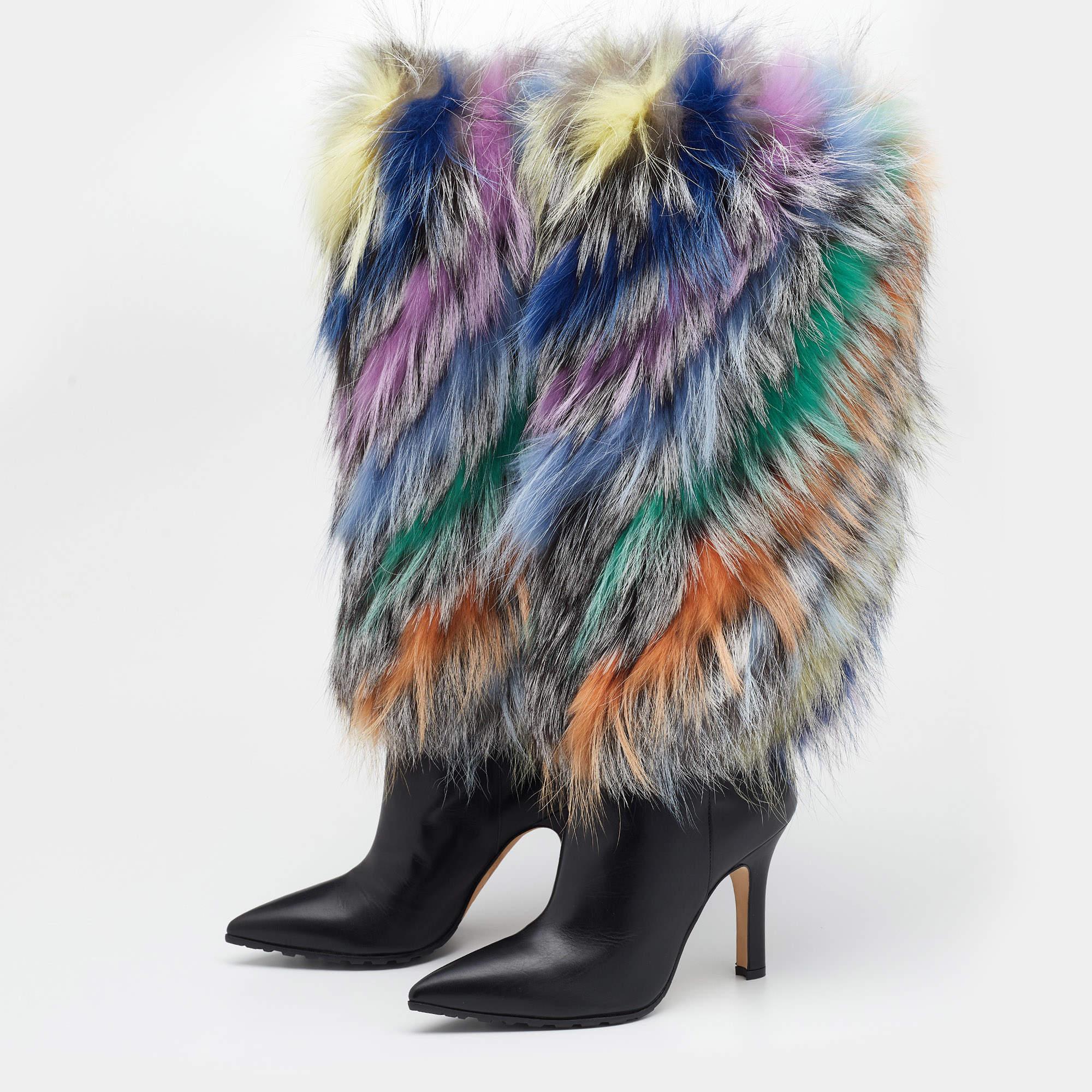 Make a glamorous entrance wearing these super-chic and artistic boots from Manolo Blahnik. They have been crafted from multicolored leather and fox fur with a pointed-toe design and 10 cm heels. Unmissable and worth the investment, you can team them