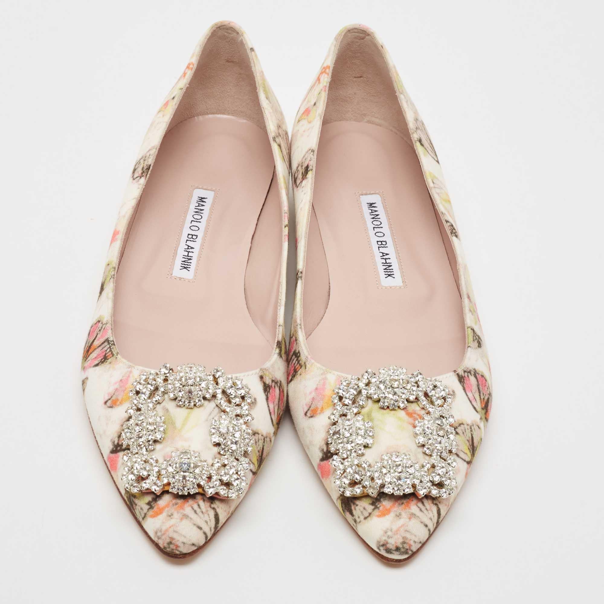 You know you are going to have a glamorous day the moment you put these ballet flats on. They are a Manolo Blahnik creation, meticulously crafted from multicolor satin and lined with leather on the insoles. The pair carries striking embellishments