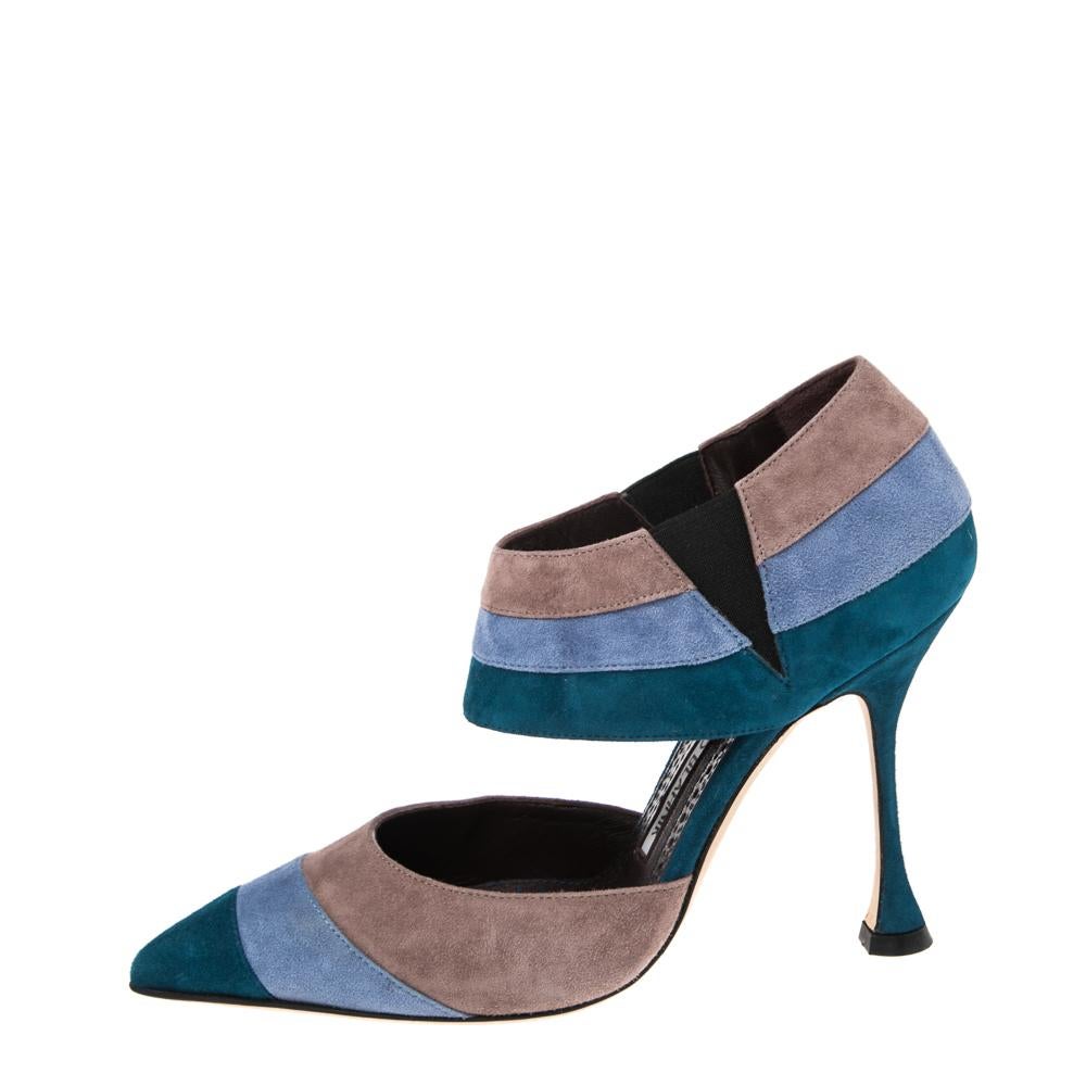 These Manolo Blahnik sandals are artfully crafted from colorful suede that lends it a contemporary chic look. Featuring a pointed-toe silhouette, this pair comes with elasticized ankle straps and high heels. Look your fashionable best by styling